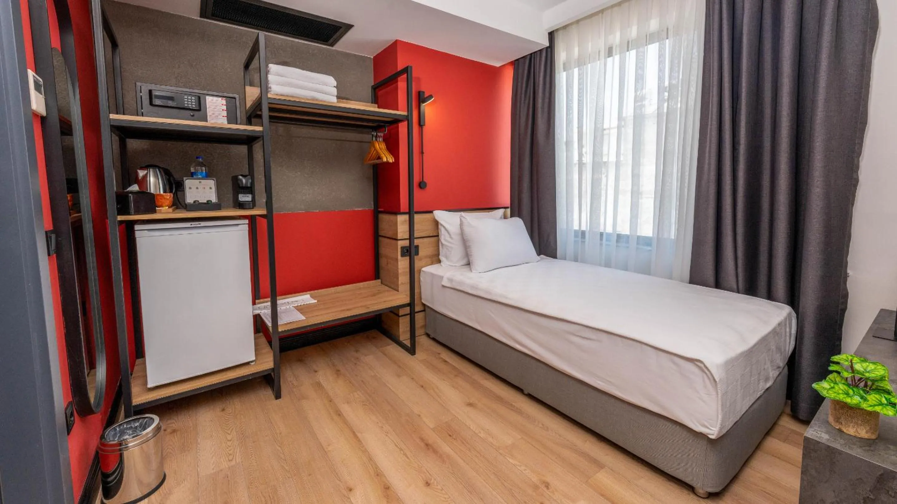 Bedroom in Just Inn City