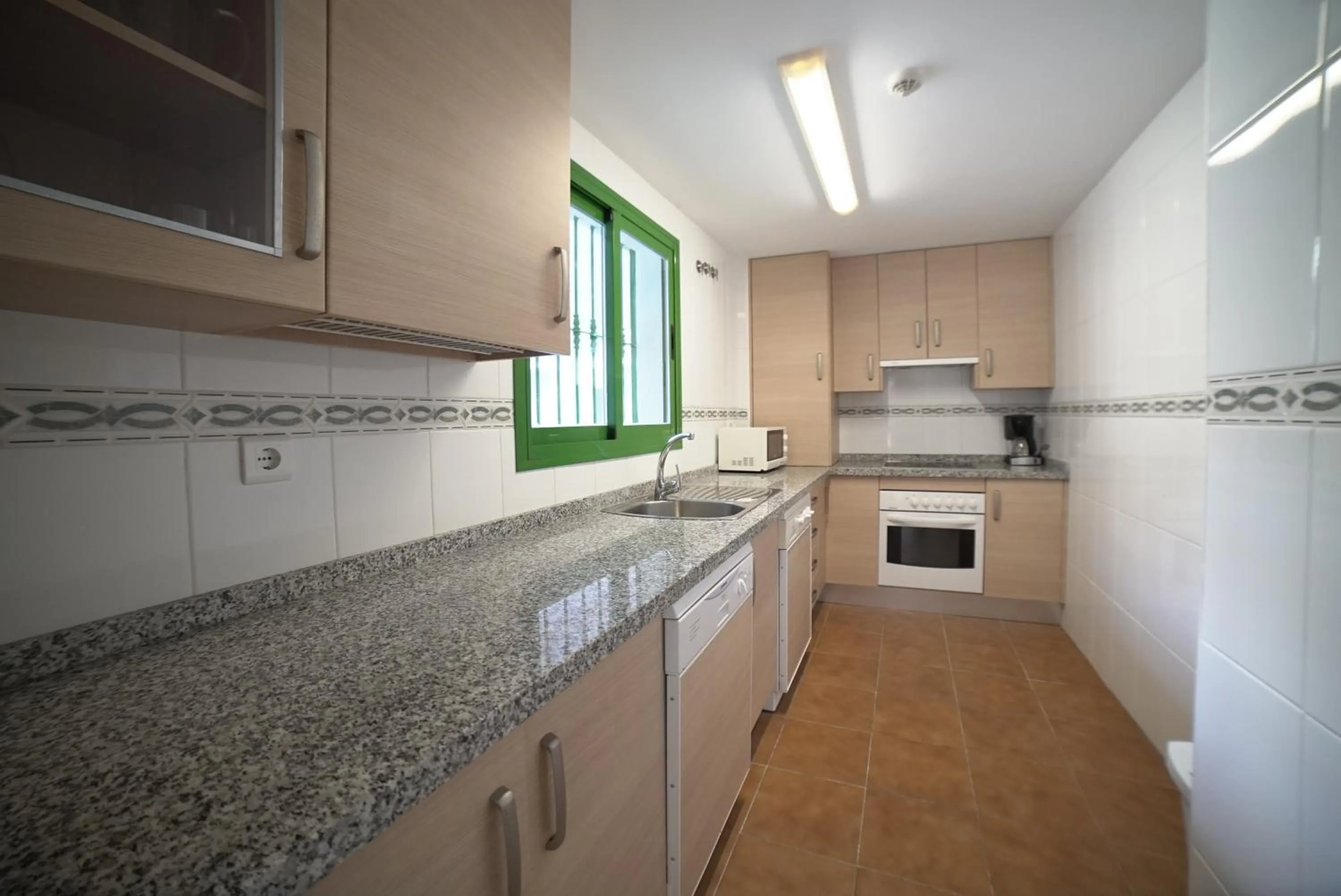 Kitchen or kitchenette in Hotel Apartamentos Manilva Sun