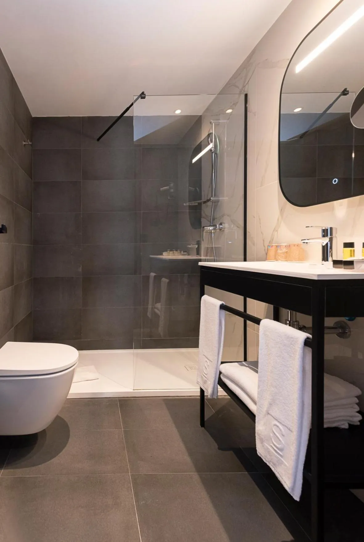 Bathroom in Sercotel Plana Suites