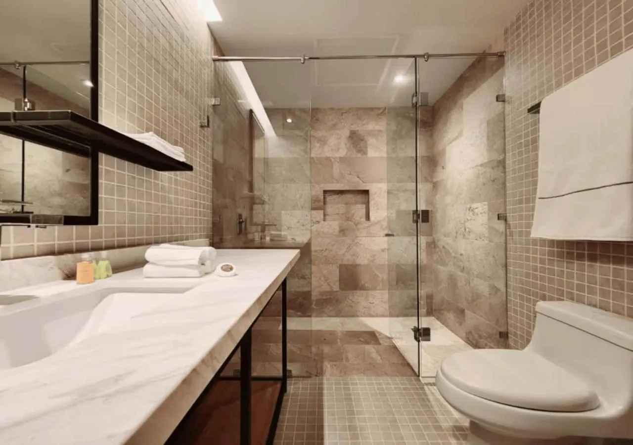 Shower in Luxury 1BR Condo Prime Location