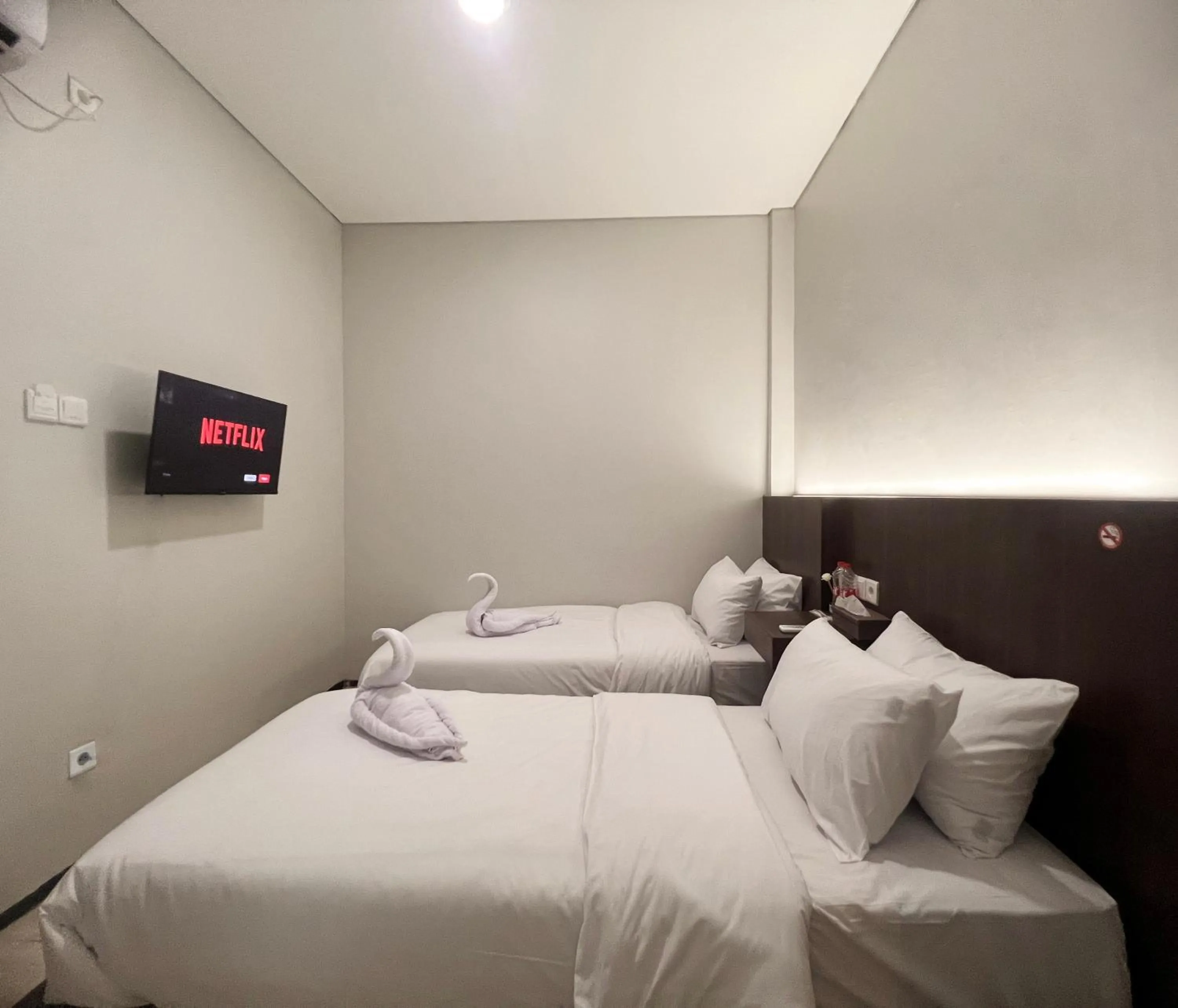 Bed in Sleep Studio Hotel City Center Surabaya