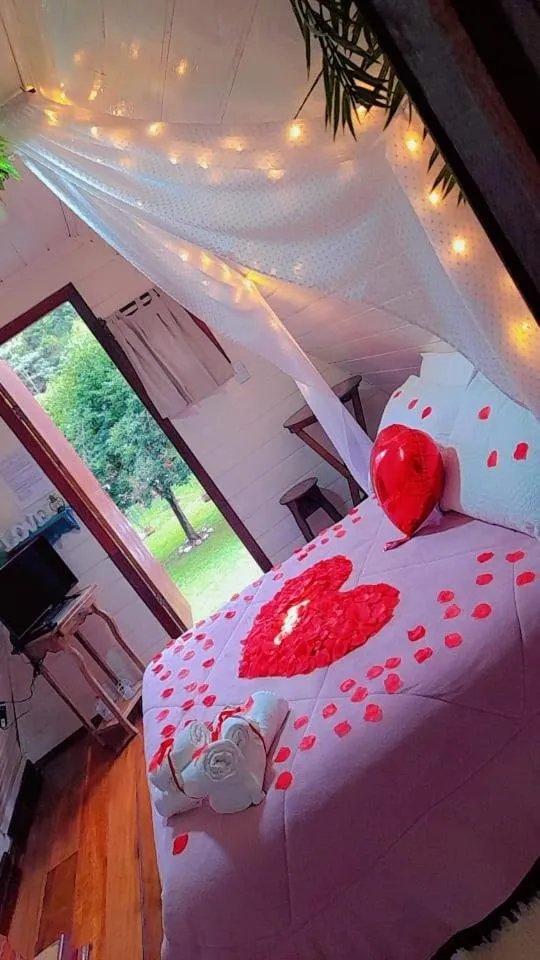 Bed in Pousada Bosque do Visconde