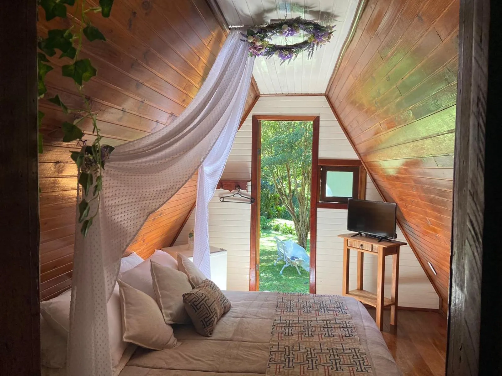 Bed in Pousada Bosque do Visconde