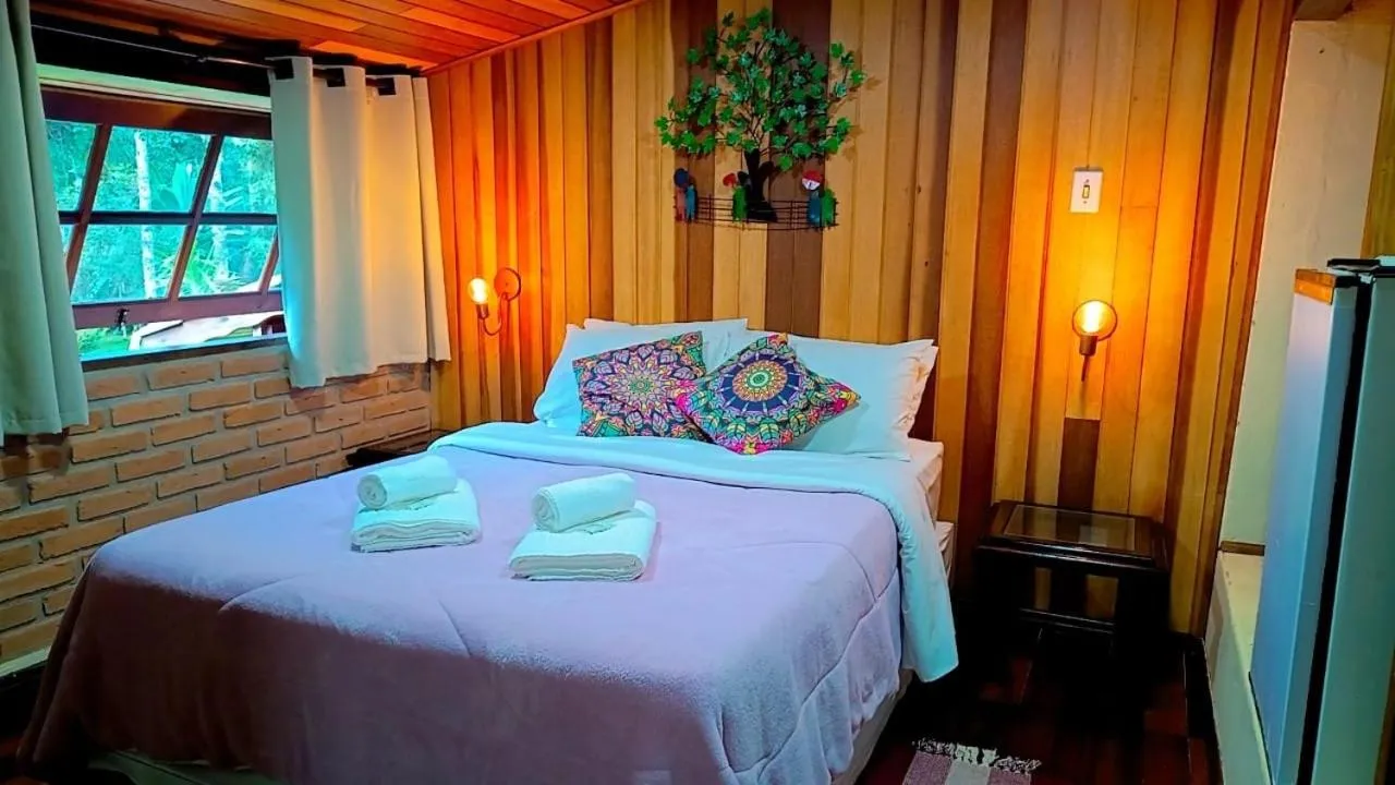 Bed in Pousada Bosque do Visconde
