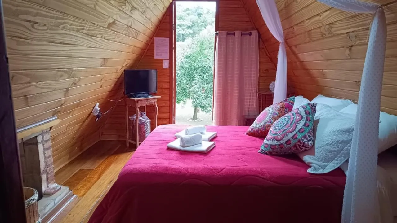Bed in Pousada Bosque do Visconde
