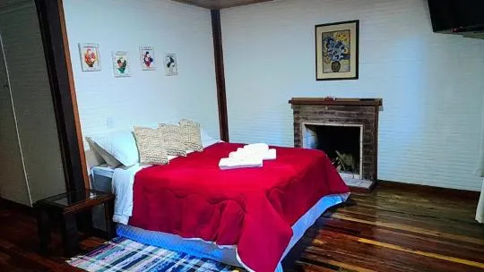 Bed in Pousada Bosque do Visconde