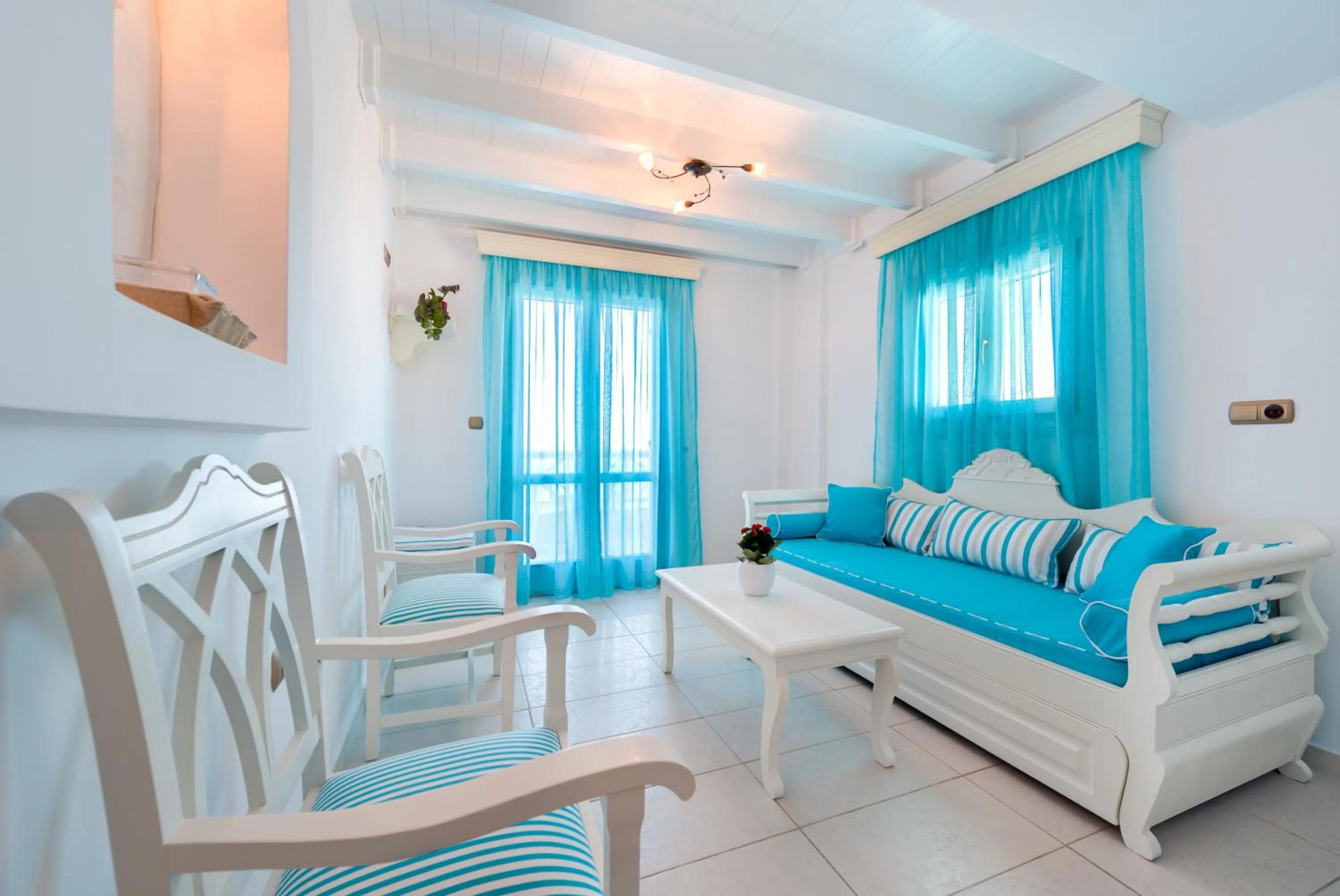 Living room, Bed in Ellinon Thea Boutique Hotel