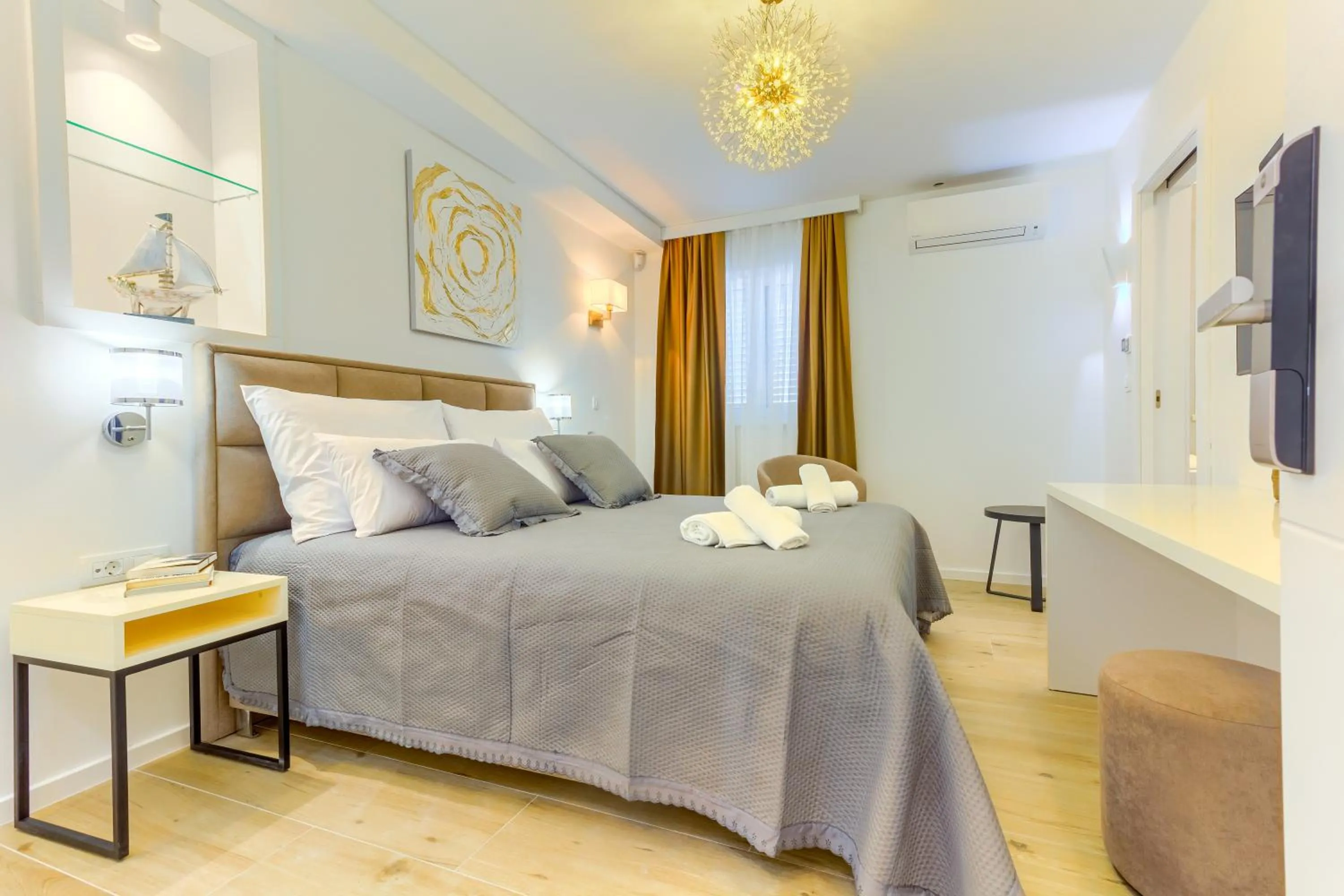 Bed in Irini Luxury Rooms