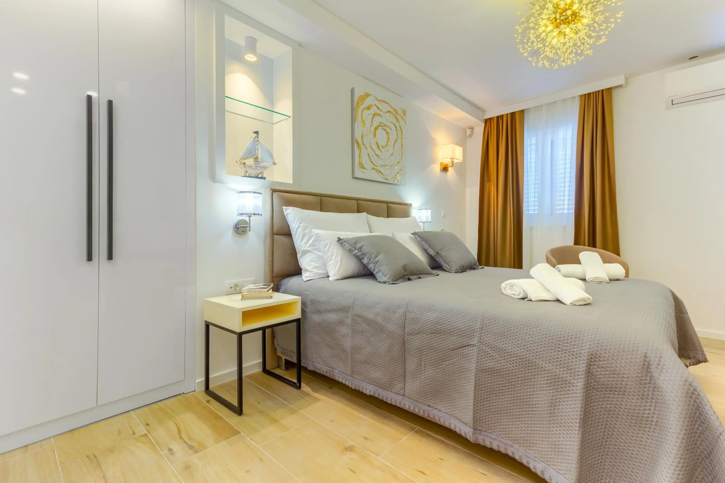 Bed in Irini Luxury Rooms
