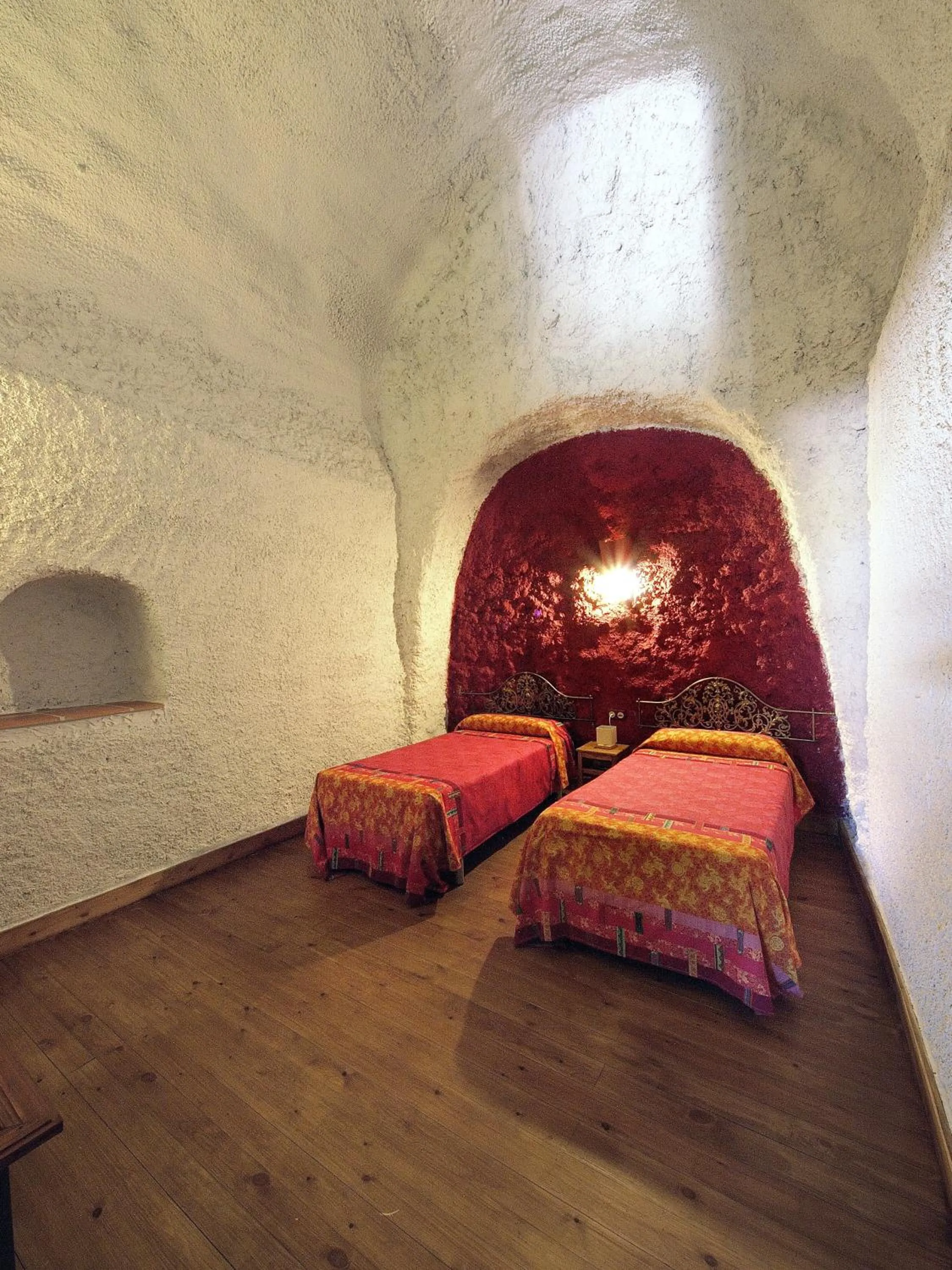 Bedroom, Bed in Casas Cueva y Cortijo La Tala en Guadix