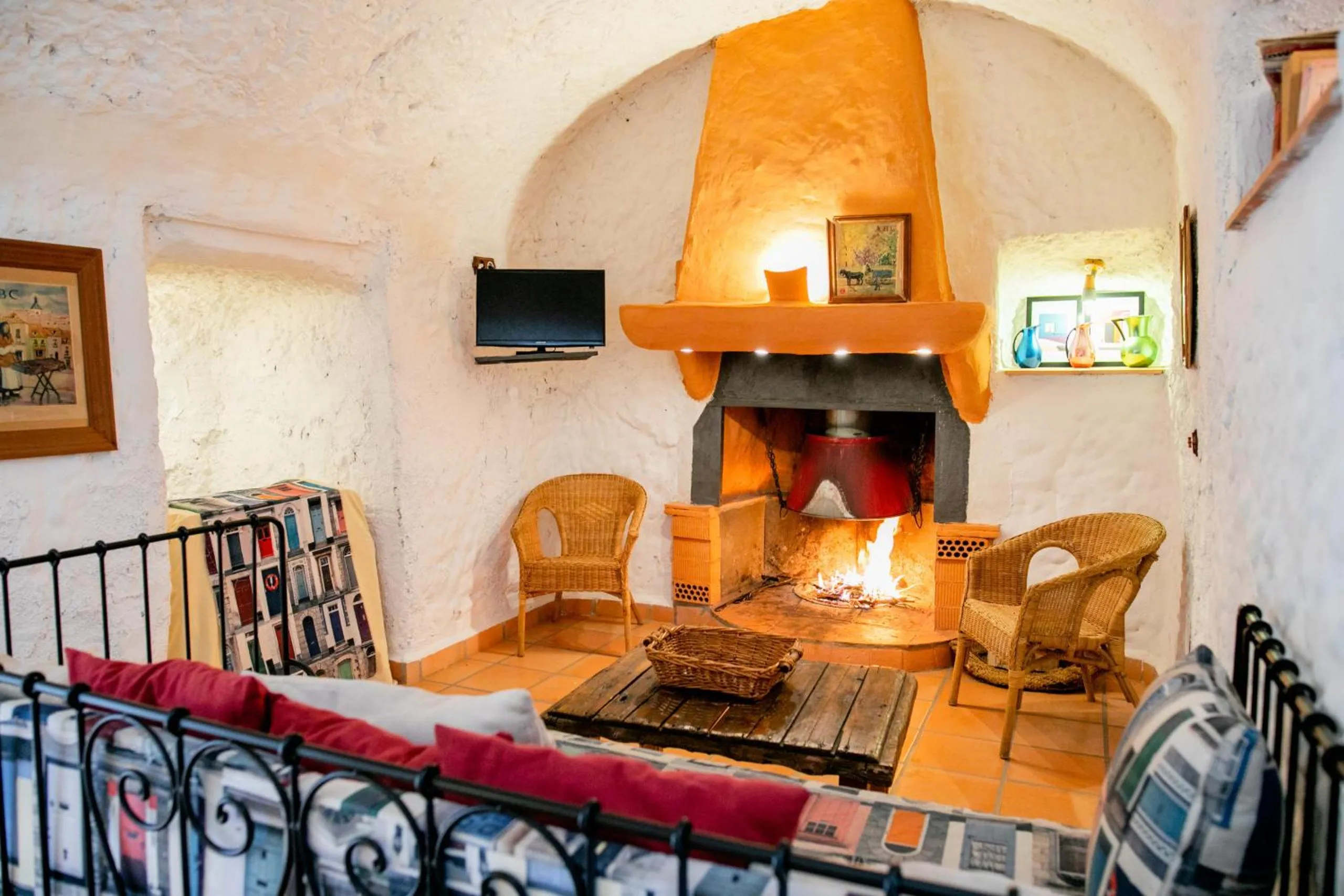 fireplace in Casas Cueva y Cortijo La Tala en Guadix