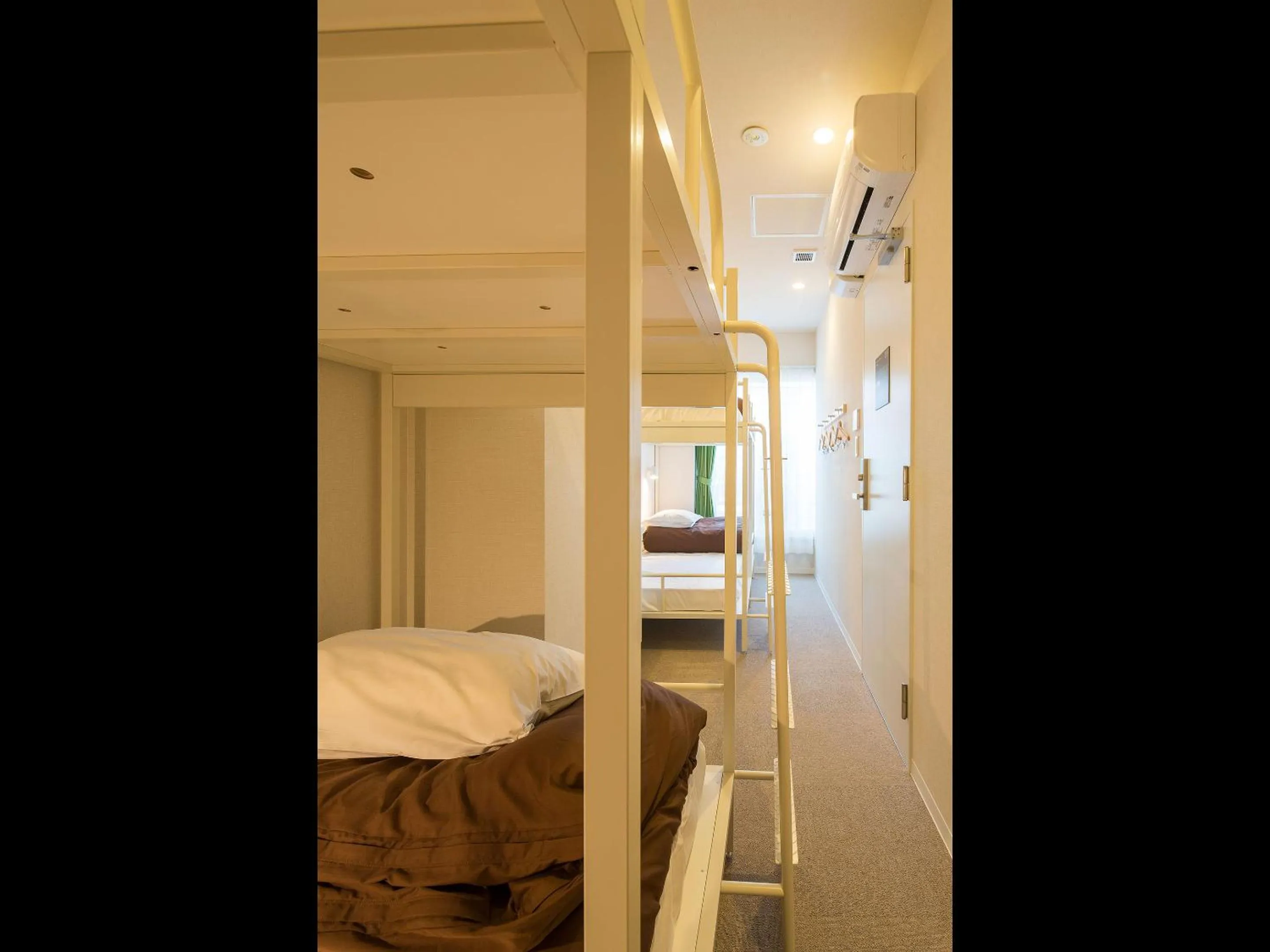 Photo of the whole room, Bed in Hotel Plus Hostel SAPPORO