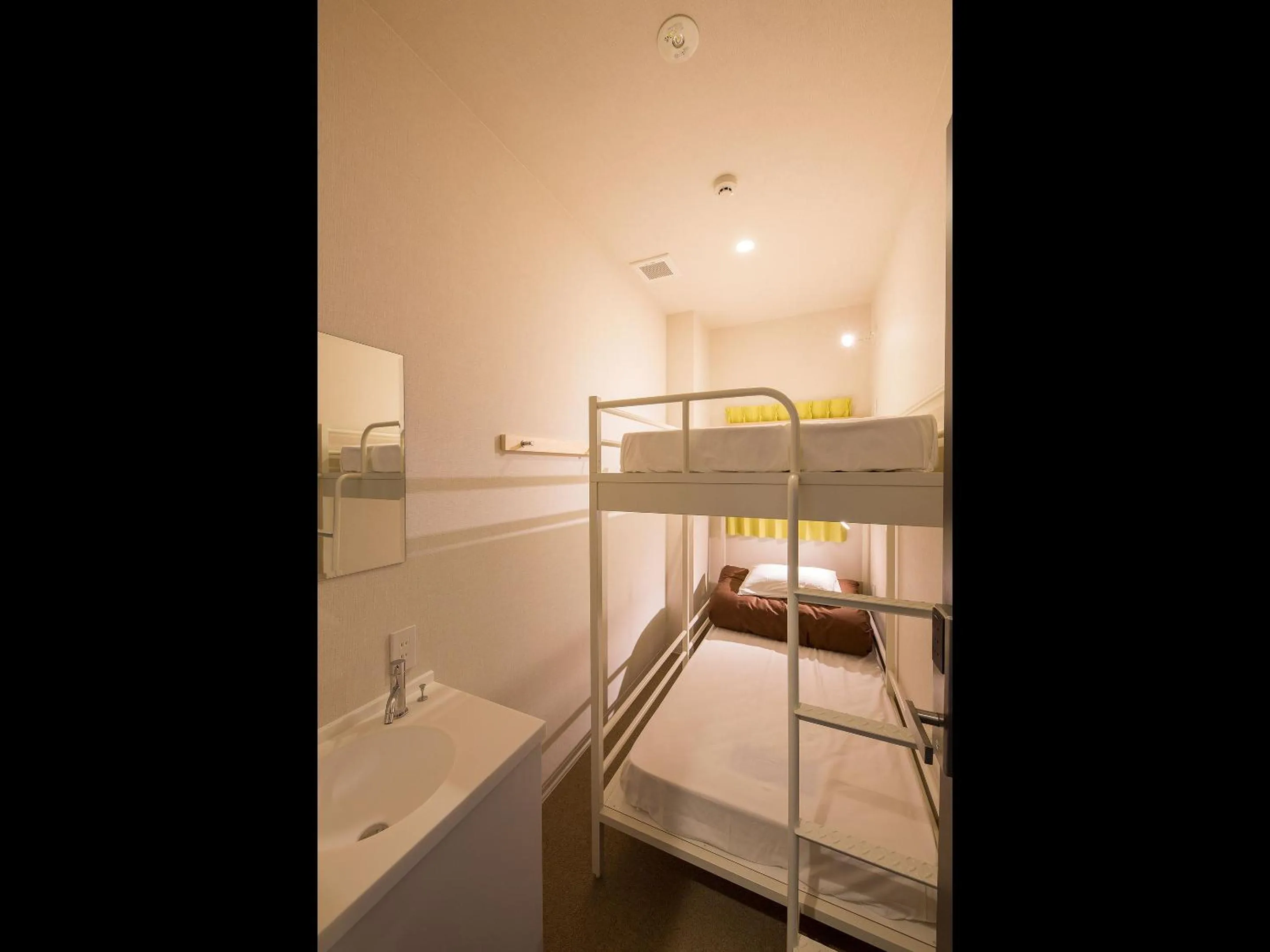 Photo of the whole room, Bed in Hotel Plus Hostel SAPPORO