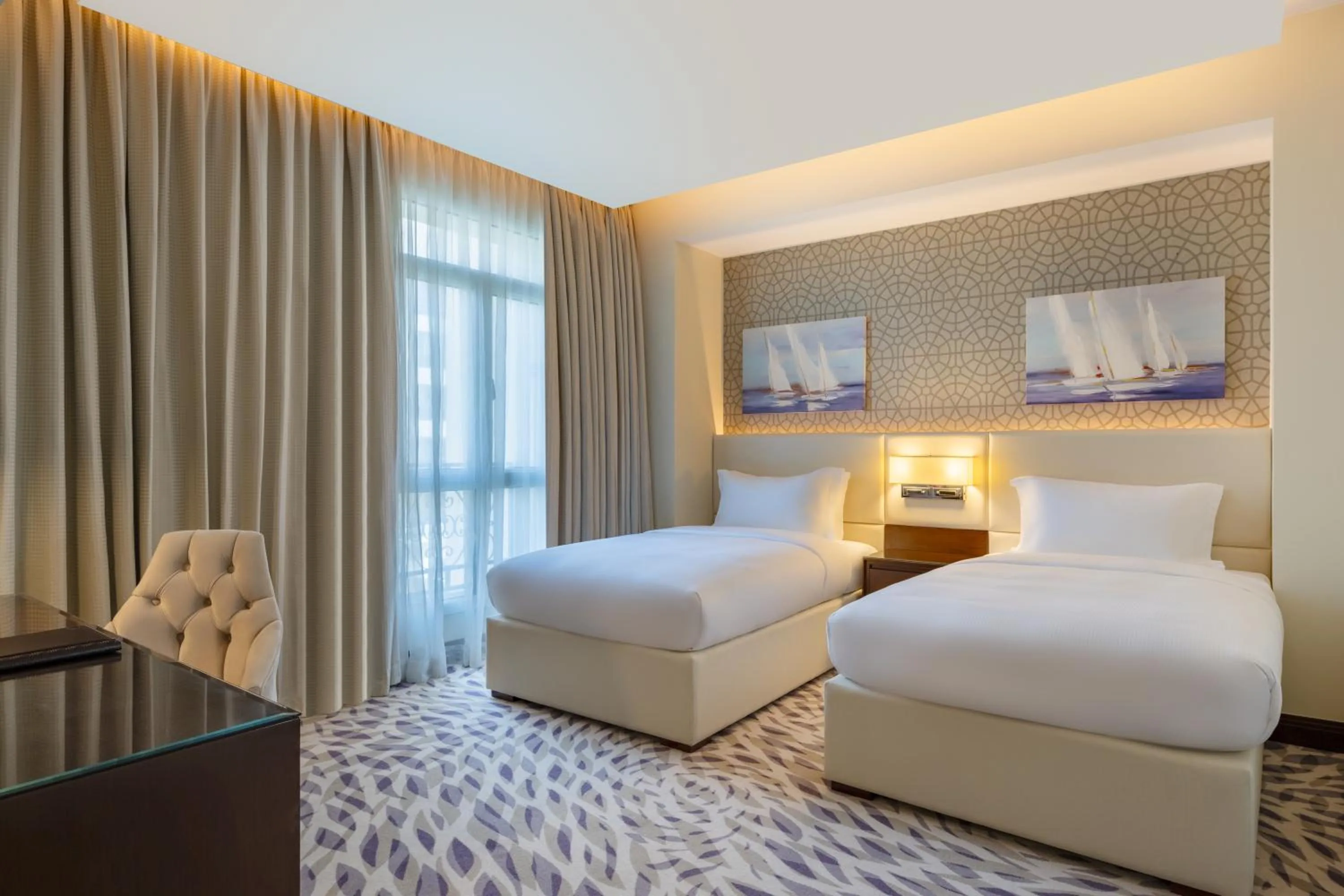 Bed in Riviera Rayhaan by Rotana Doha