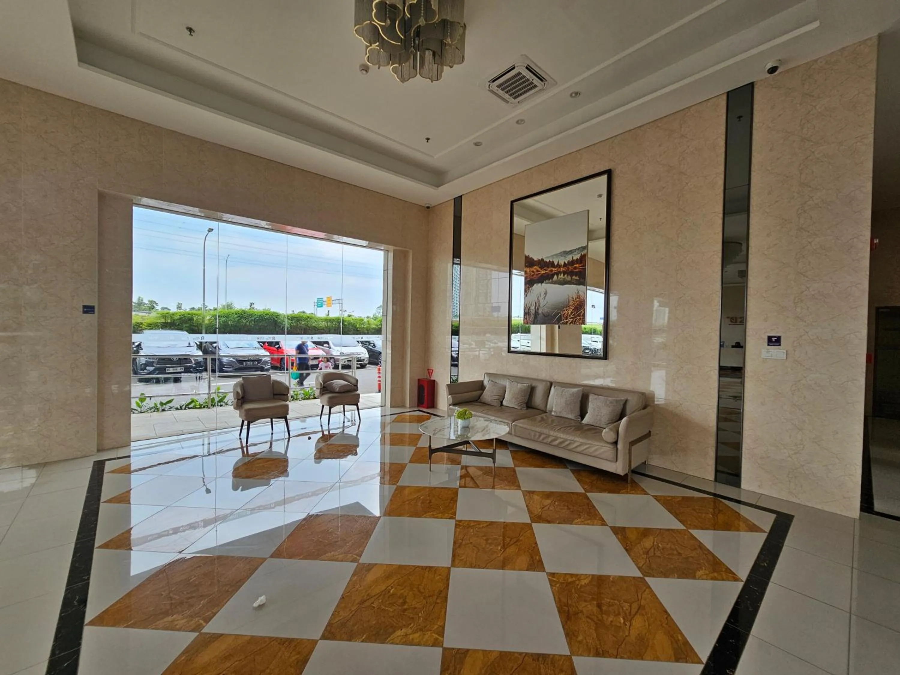 Seating area in Apartement Sky House BSD TL19D By LiviRooms