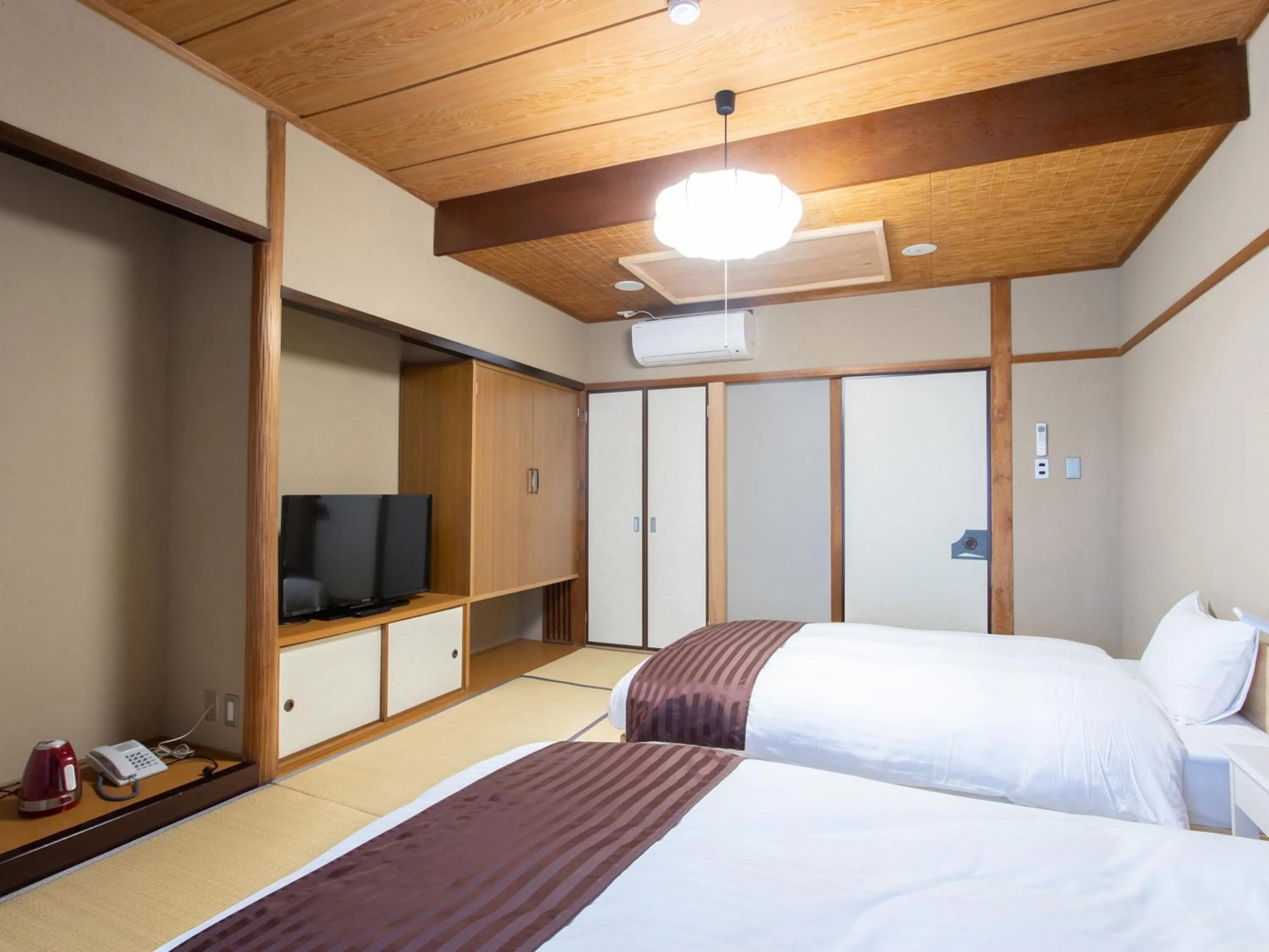 Photo of the whole room, Bed in Tabist Hotel Chouseikaku