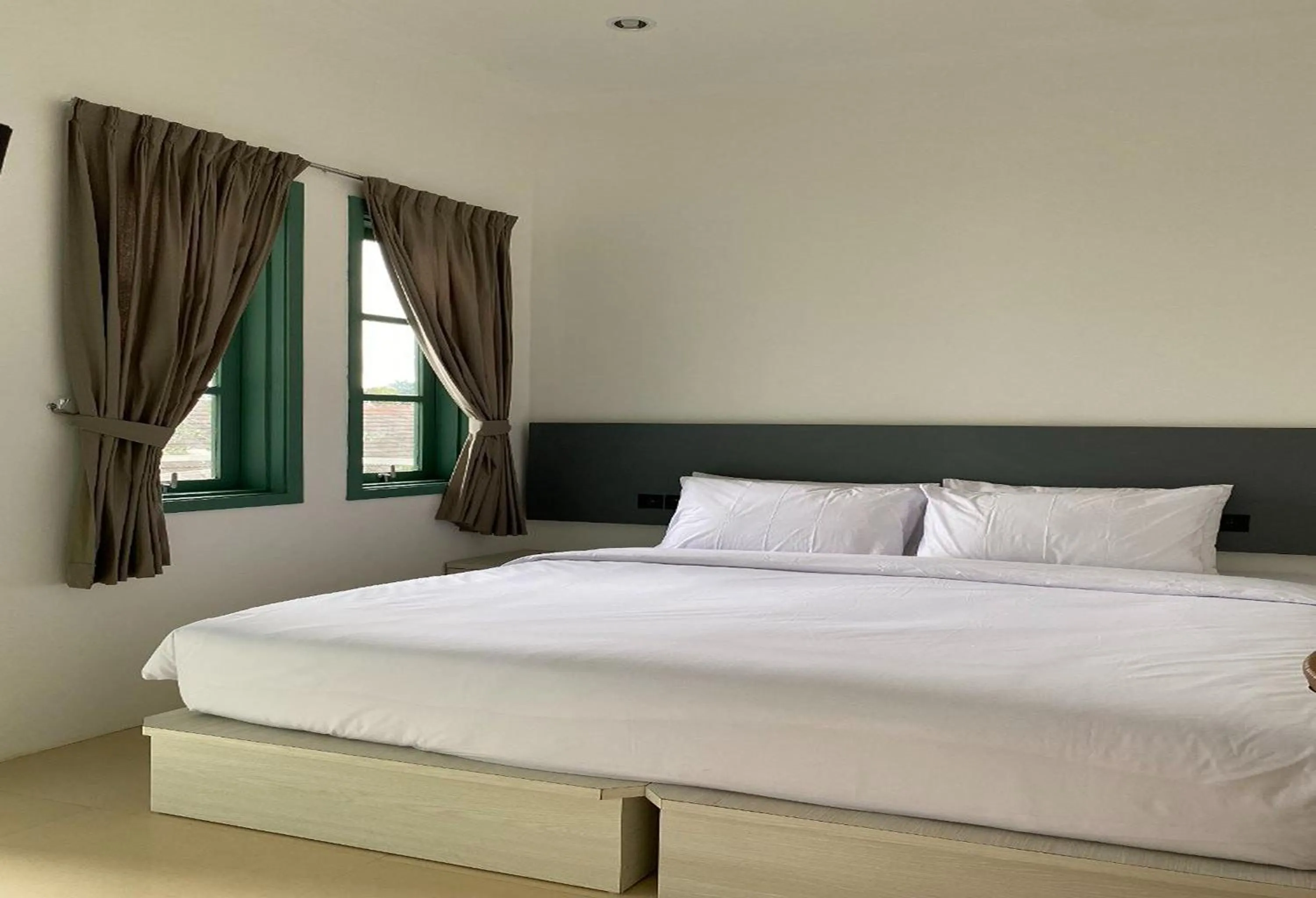 Bed in Binumar Guest House