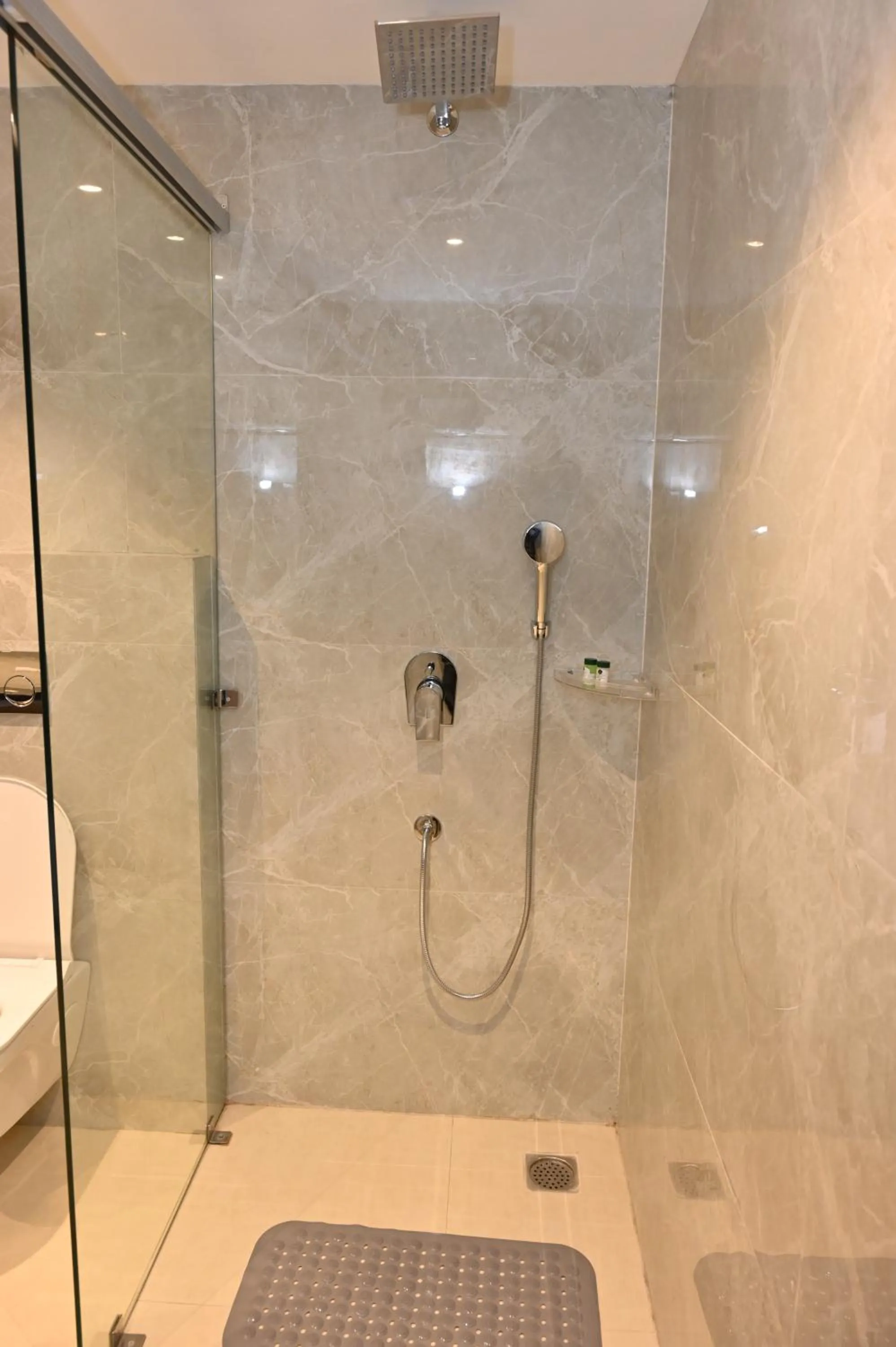 Shower in Kumbhal Exotica Resort Kumbhalgarh