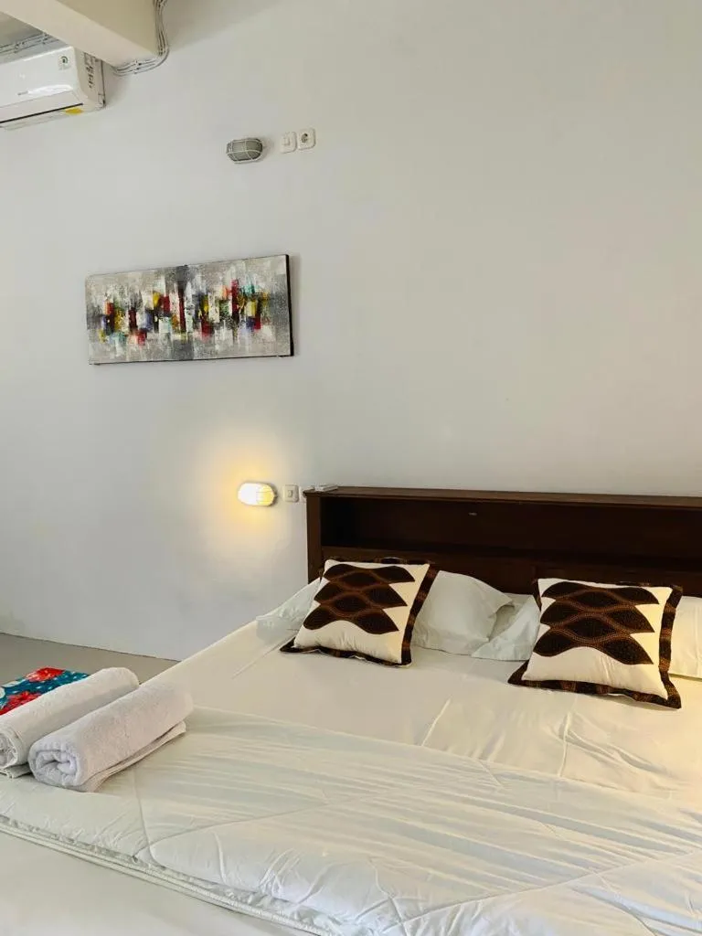 Bed in Komodo Indah Hotel