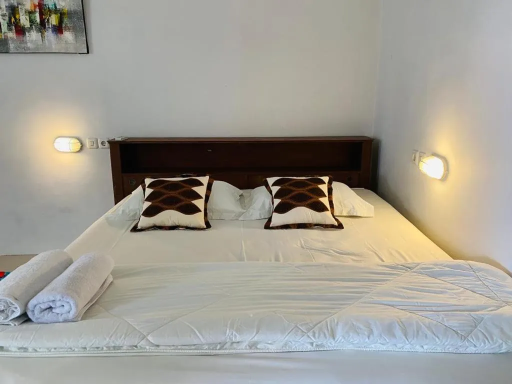 Bed in Komodo Indah Hotel