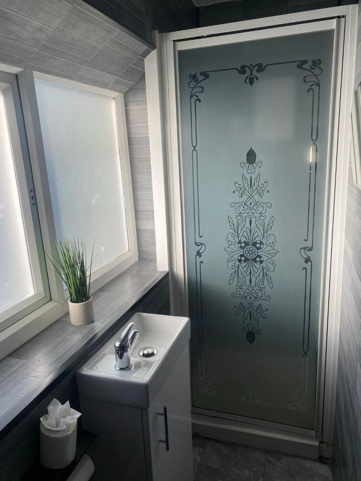 Bathroom in Black Ocean Holiday Apartments