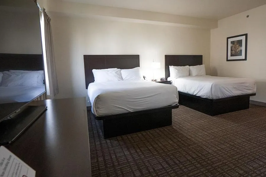 Bed in Cobblestone Hotel & Suites-Sheldon