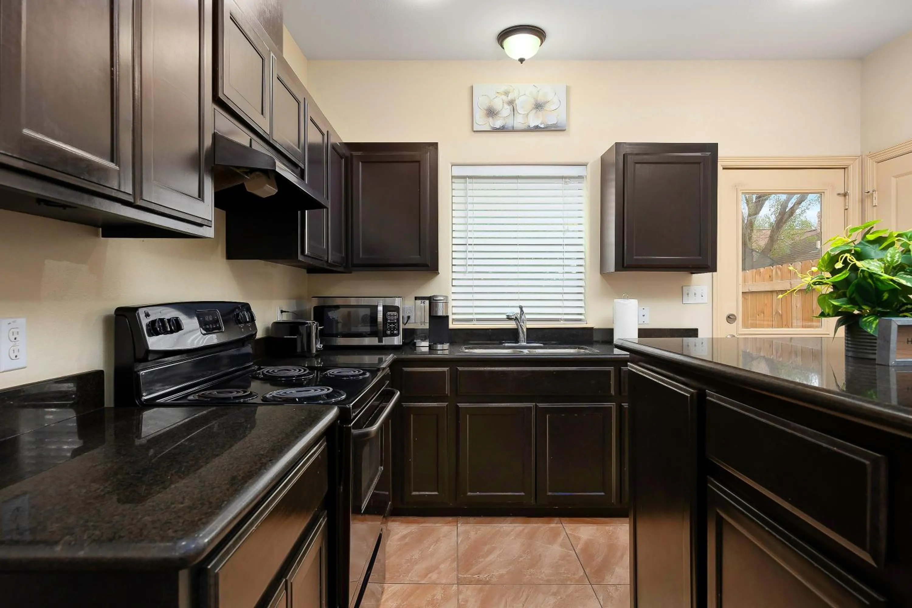 Kitchen or kitchenette in Hummingbird Haven 3 with Patio