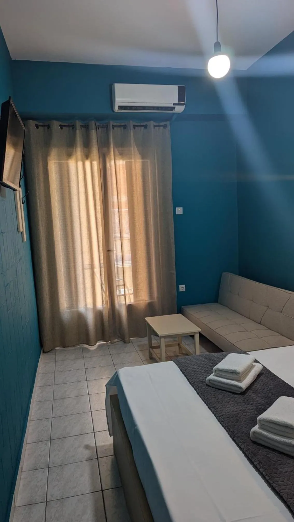 Bed in Hotel Theoxenia