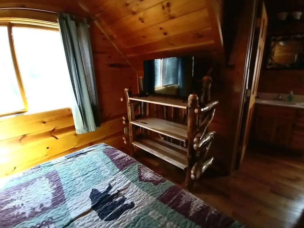 Bedroom, Bed in Alpenhaus Cabins Real Log Home in Helen Ga Mountains with hot tub and balconies