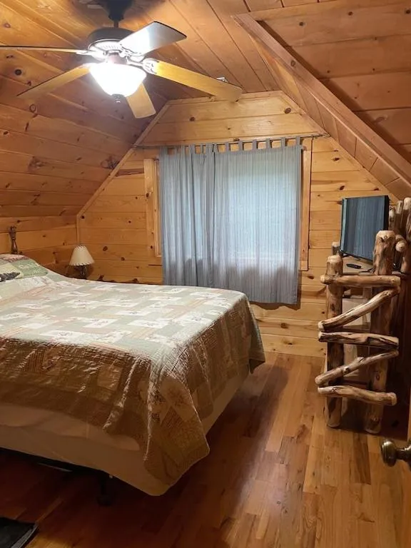 Bedroom, Bed in Alpenhaus Cabins Real Log Home in Helen Ga Mountains with hot tub and balconies