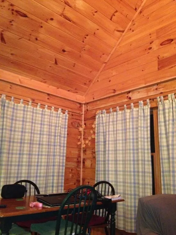 Dining area in Alpenhaus Cabins Real Log Home in Helen Ga Mountains with hot tub and balconies