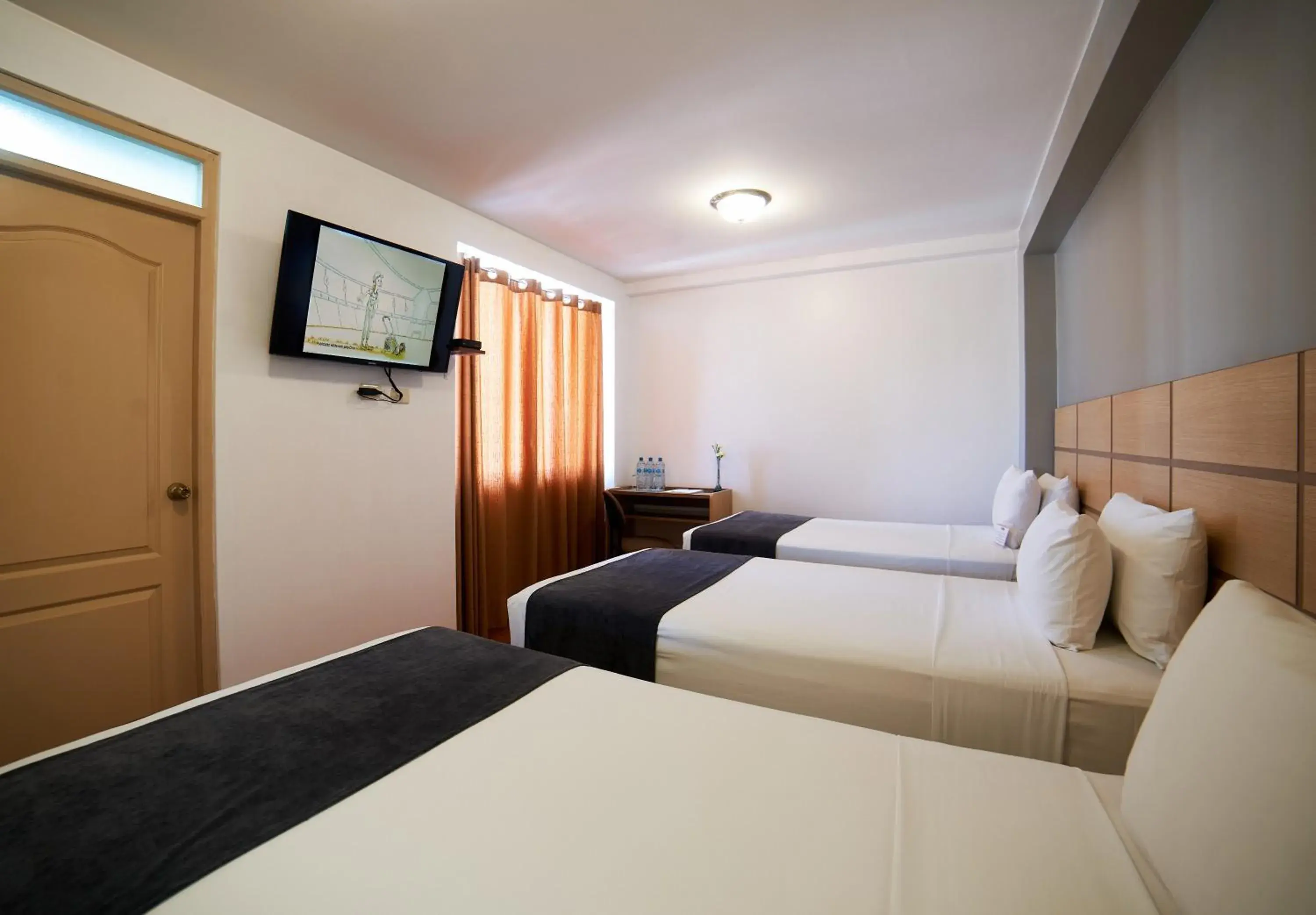 Standard Triple Room in Xima Central Tacna Standard Triple Room in Xima Central Tacna