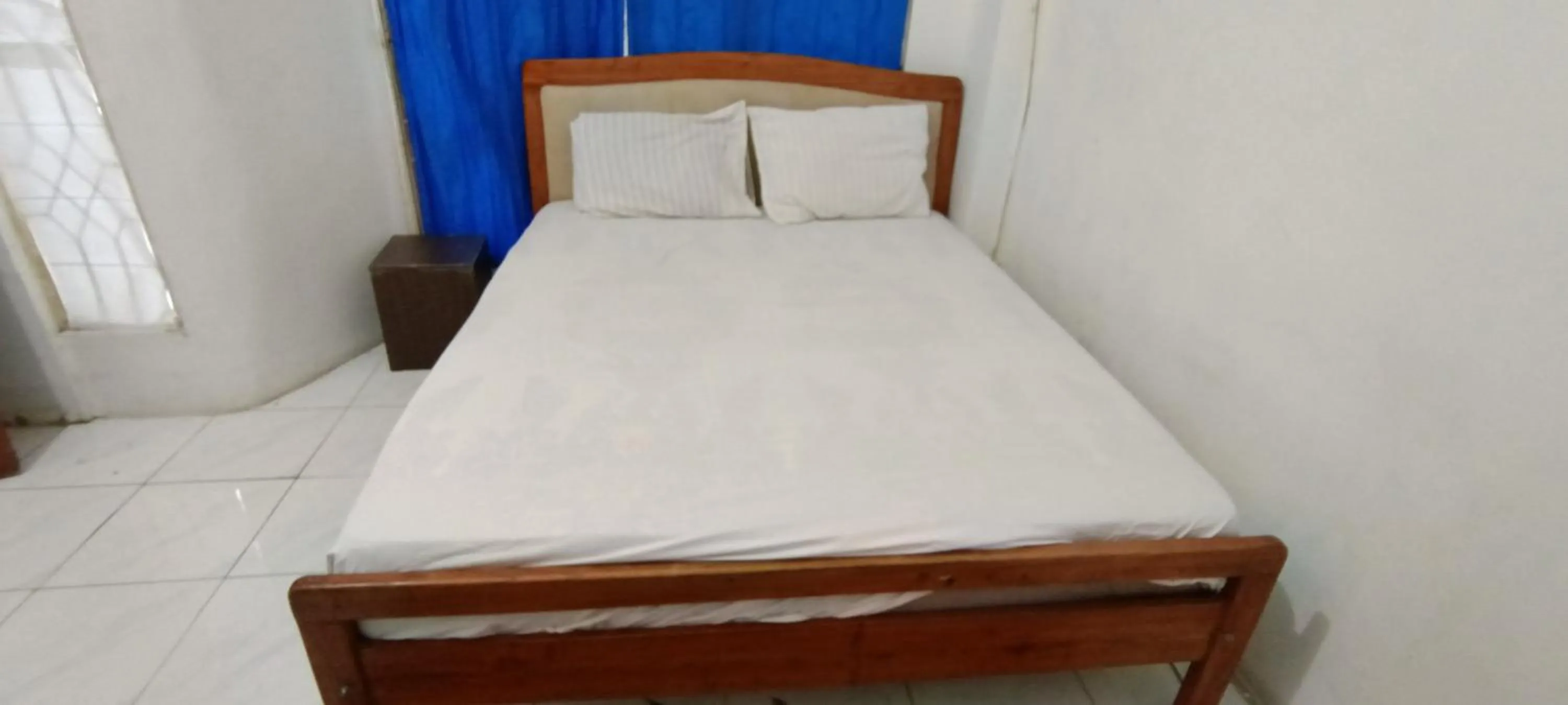 Bedroom in SPOT ON 92338 Karin Kost