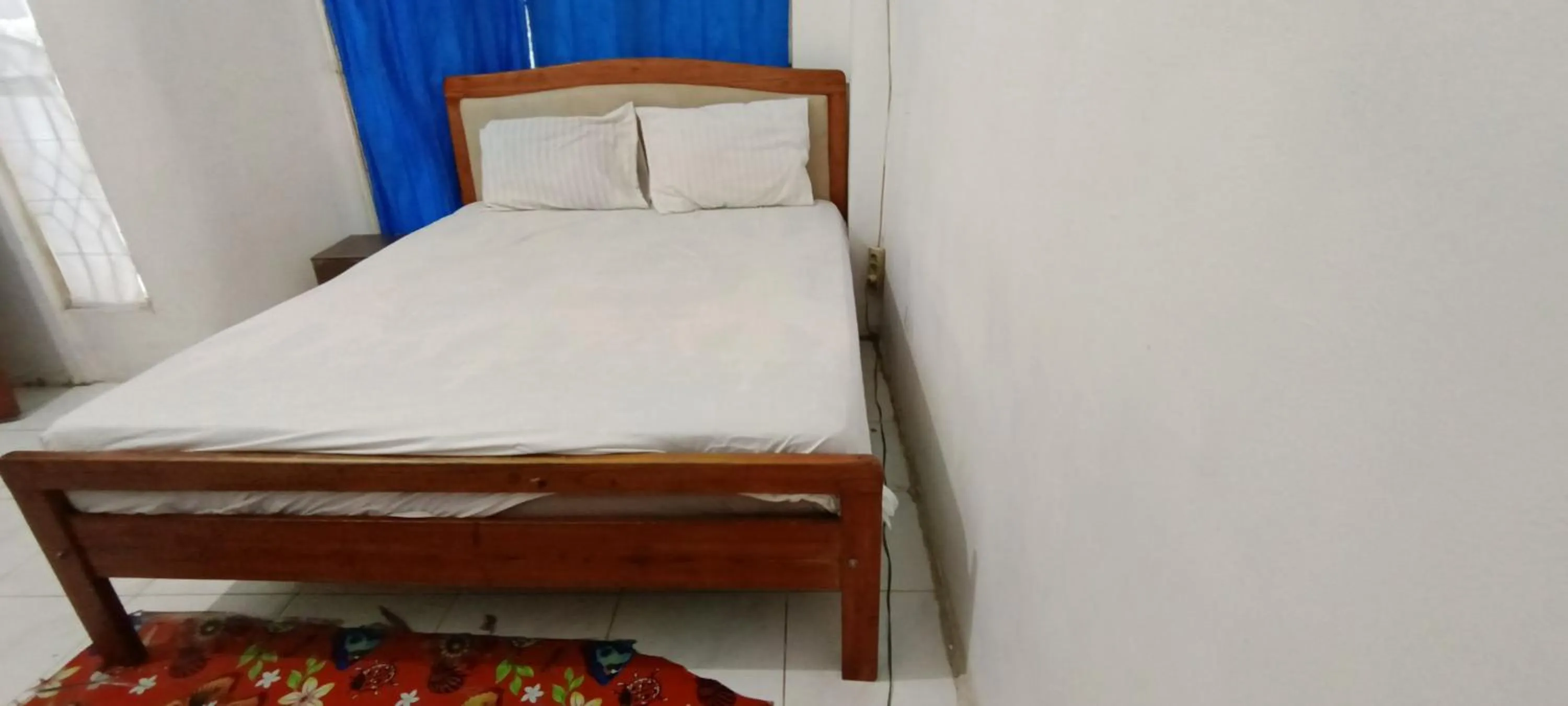 Bedroom in SPOT ON 92338 Karin Kost