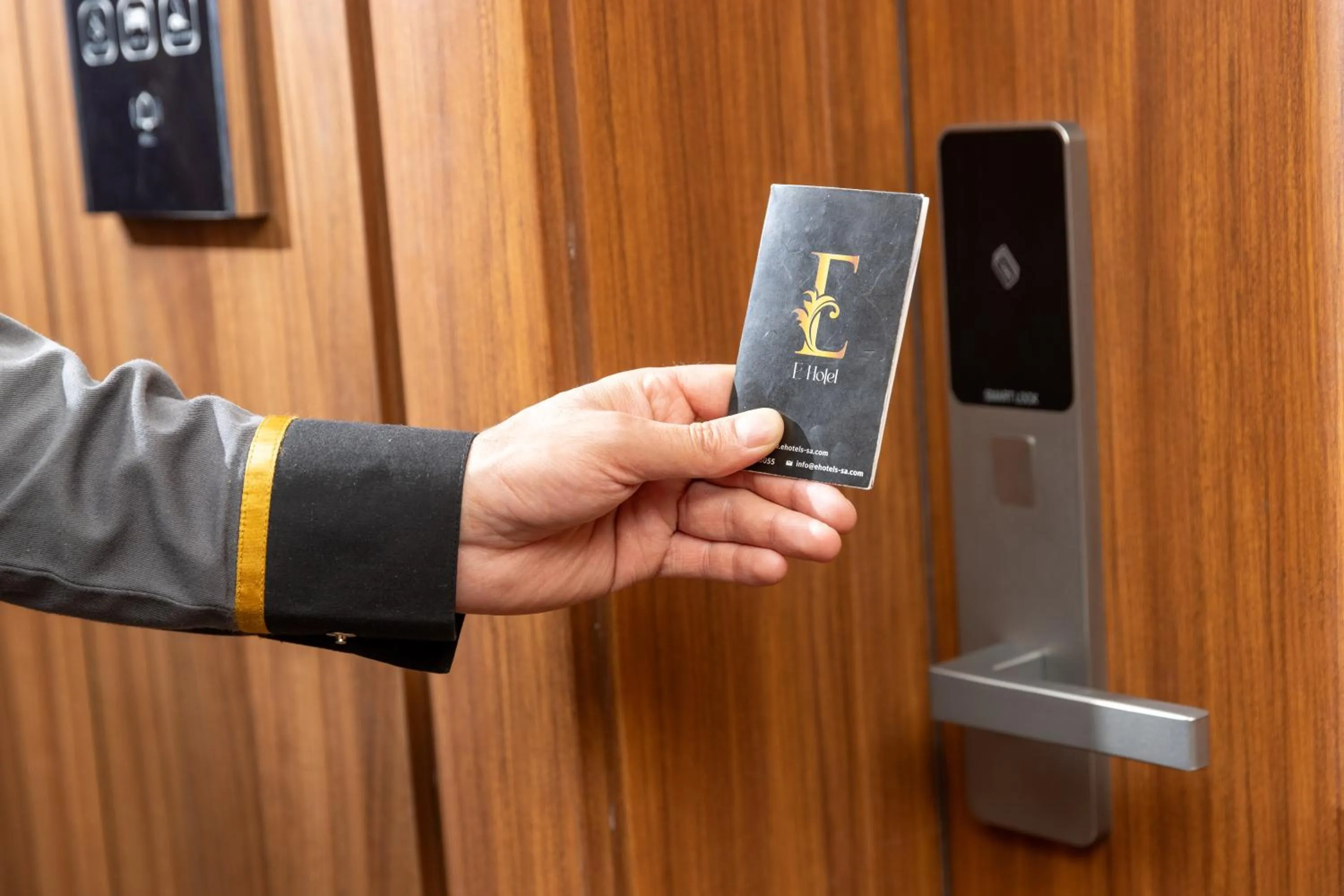 Property logo or sign in E Hotel