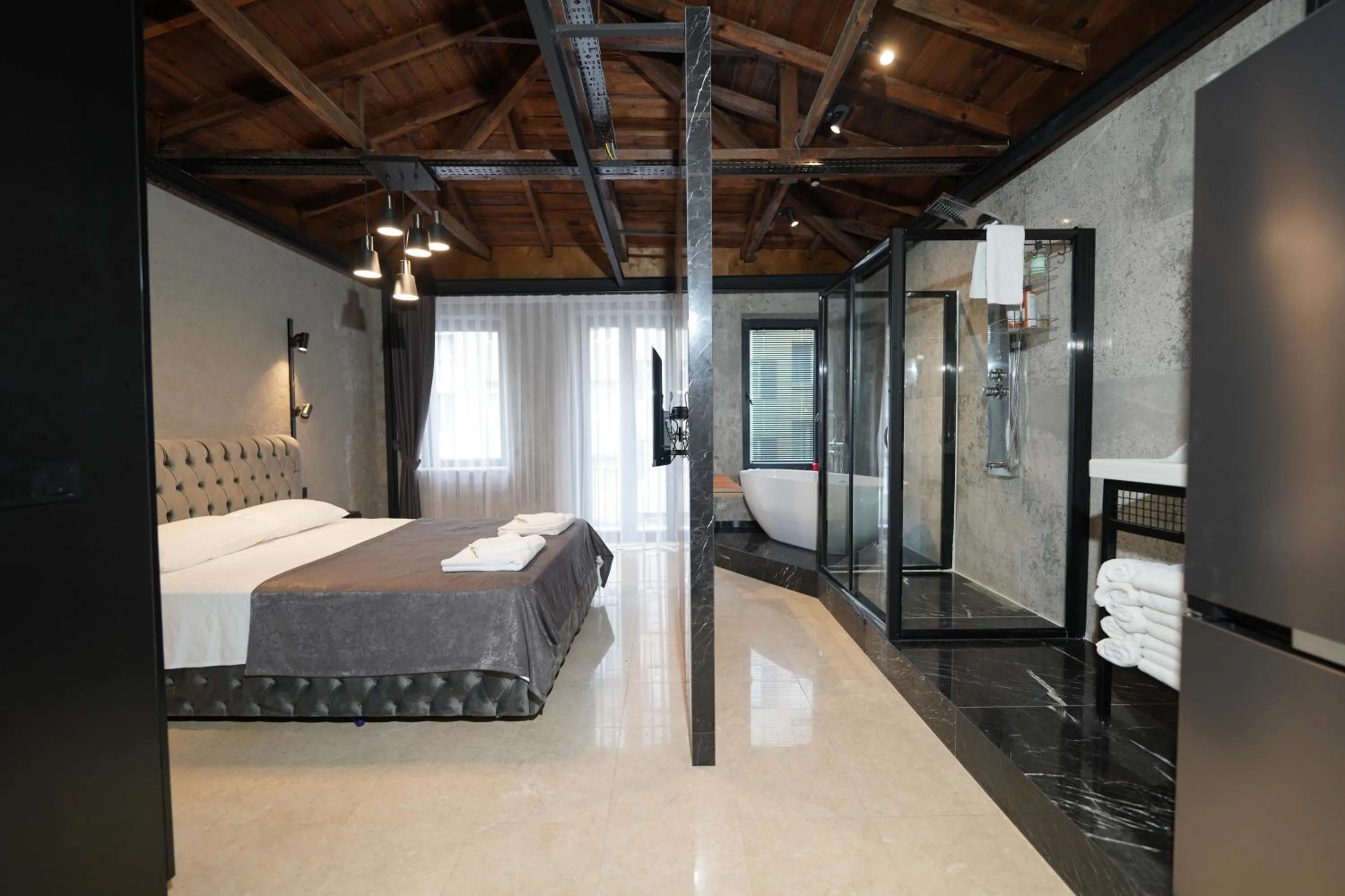 Shower, Bed in Monev Suites Hotel