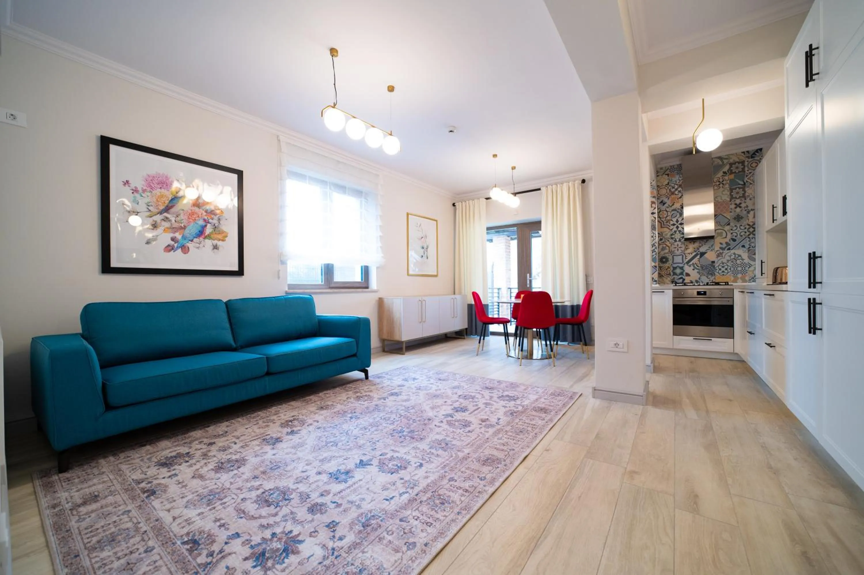 Kitchen or kitchenette in First Apartments