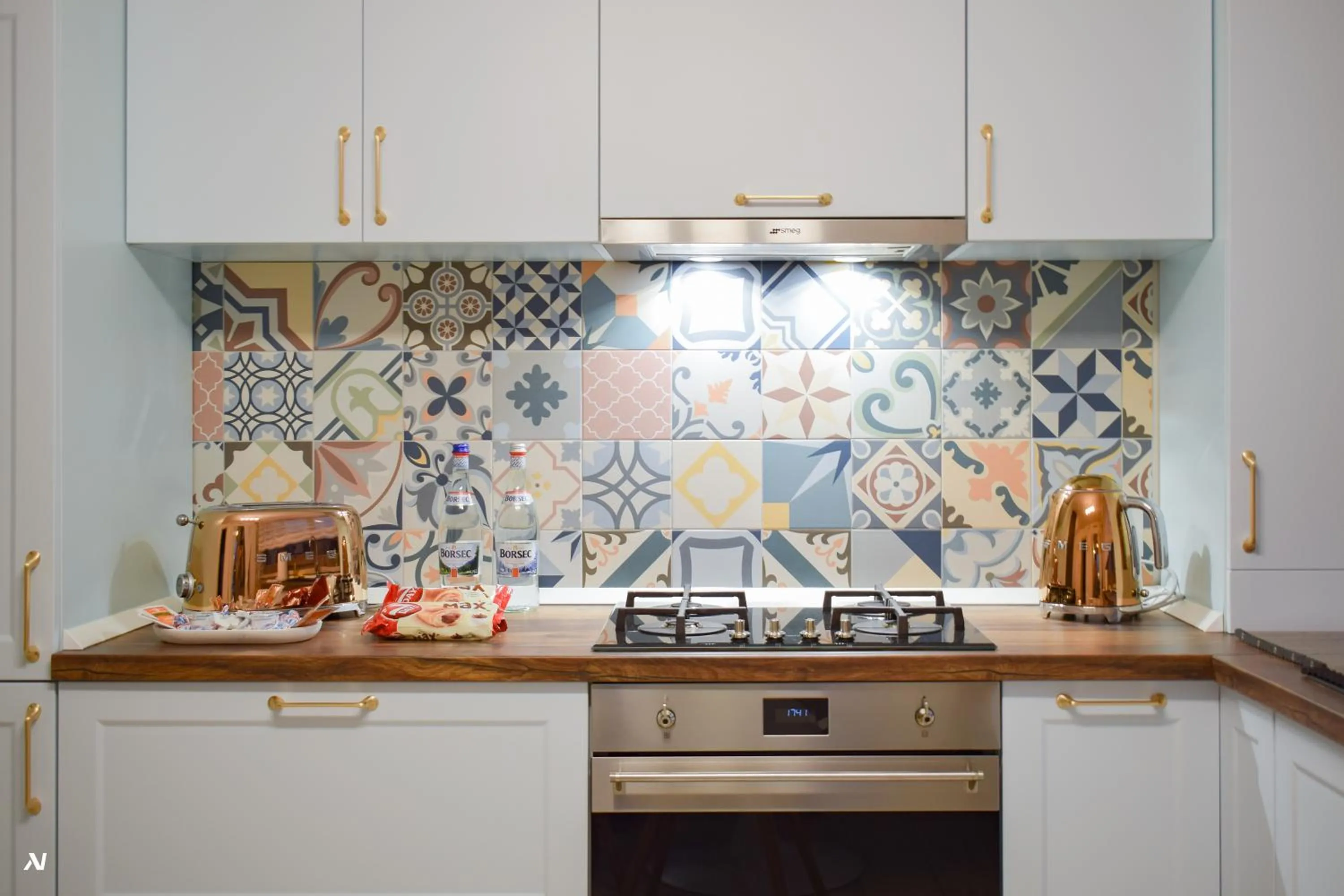 Kitchen or kitchenette in First Apartments