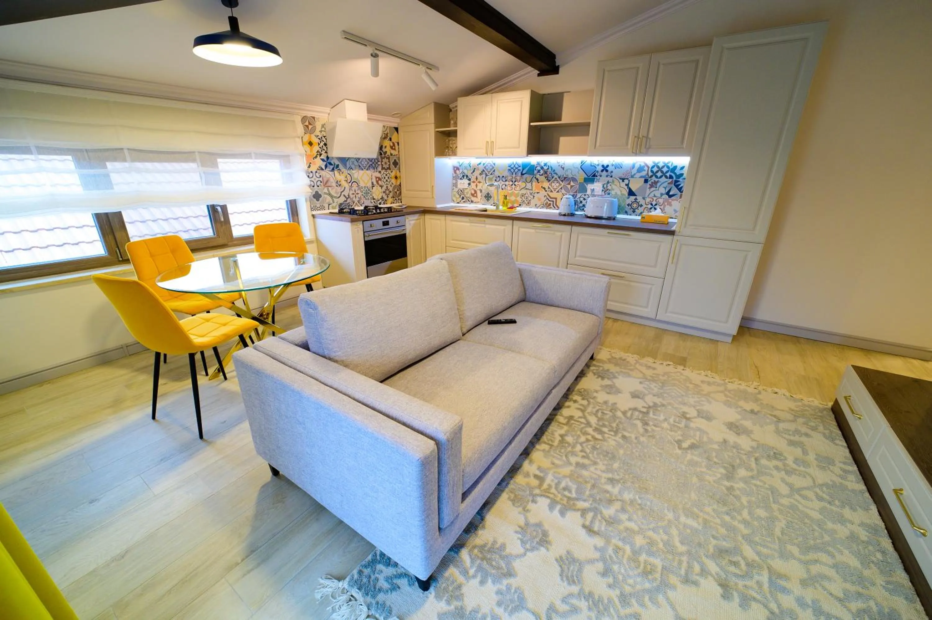 Kitchen or kitchenette in First Apartments