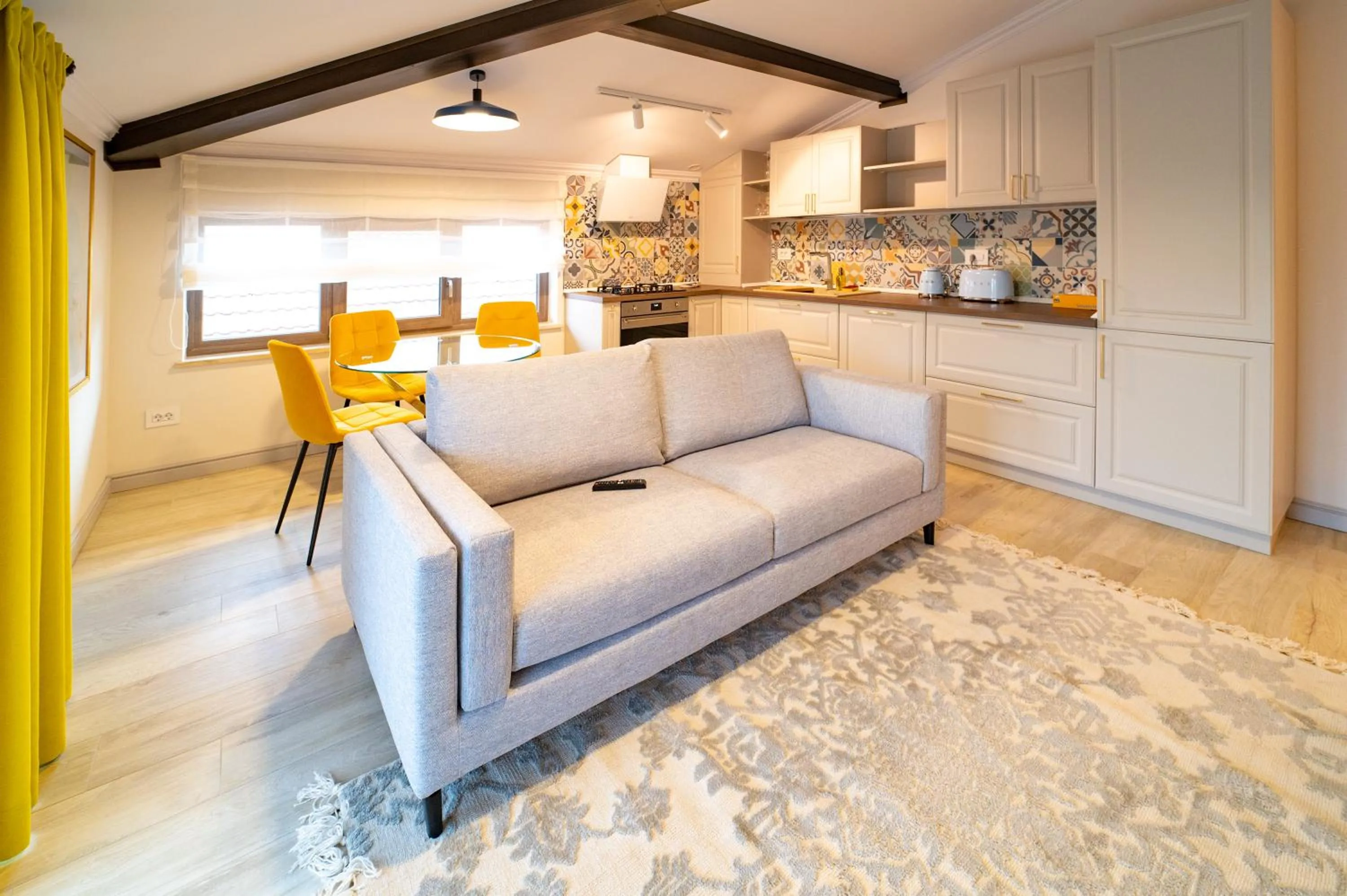 Kitchen or kitchenette in First Apartments