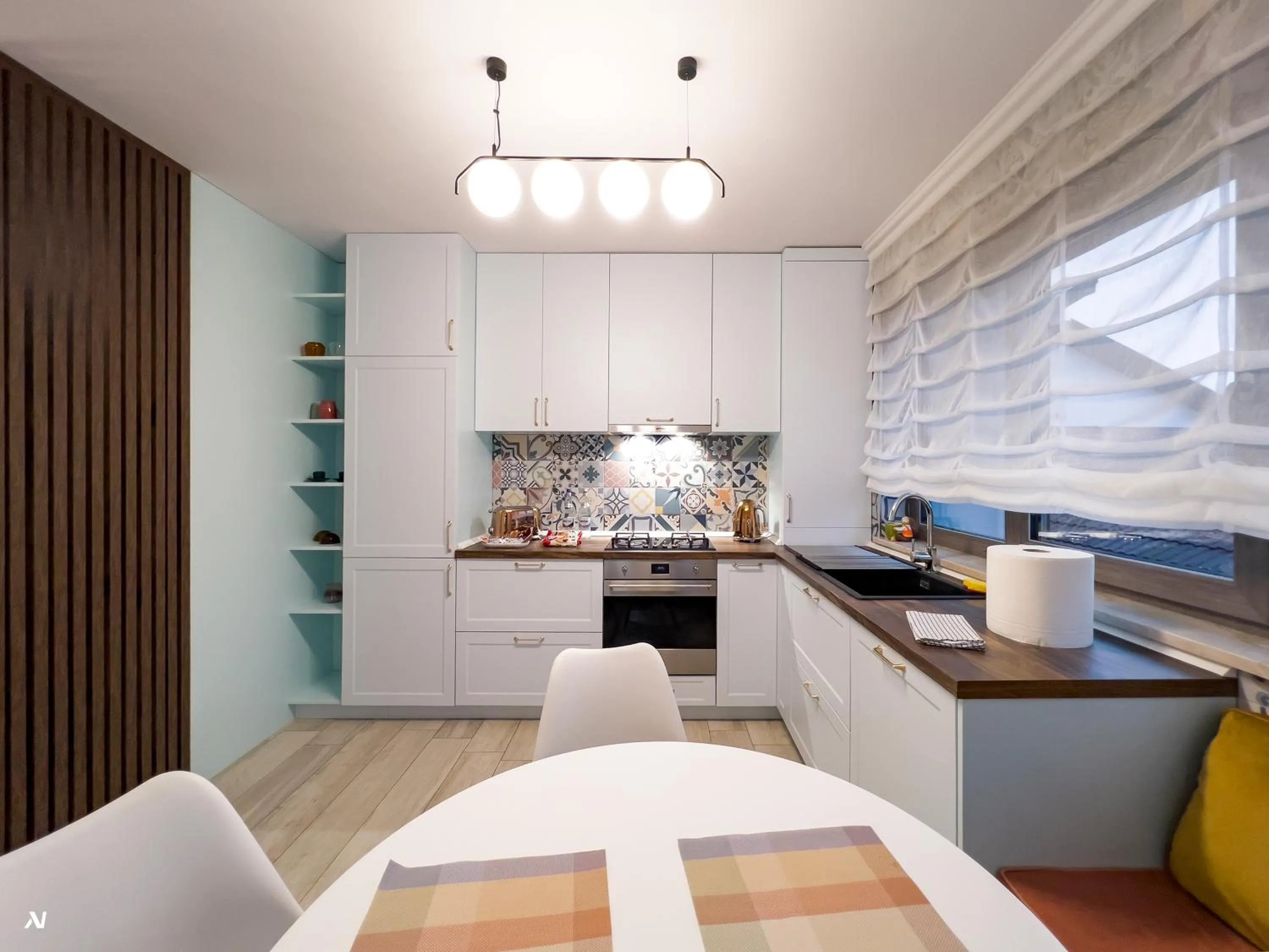 Kitchen or kitchenette in First Apartments