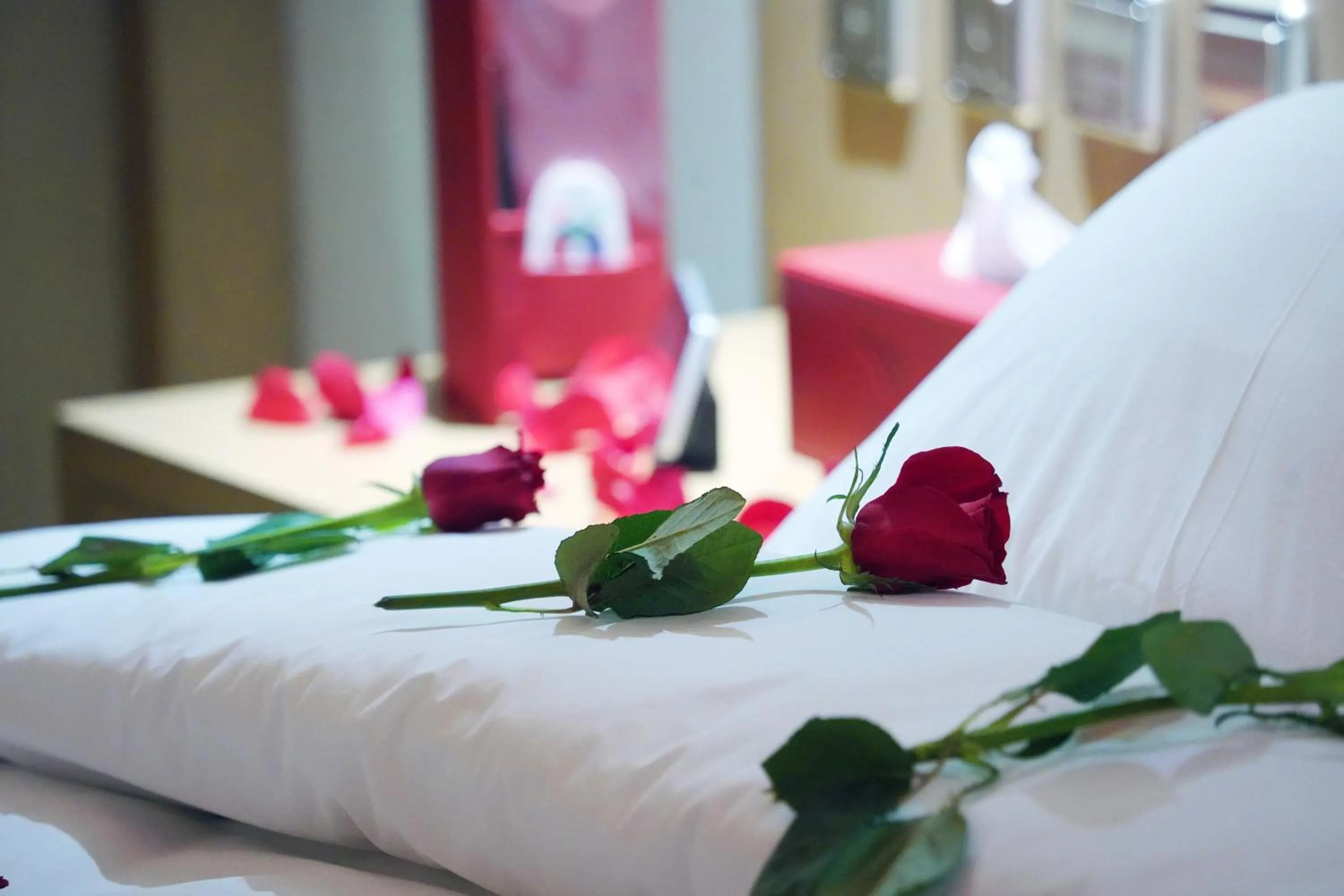 Bed in Redwaves Hotel