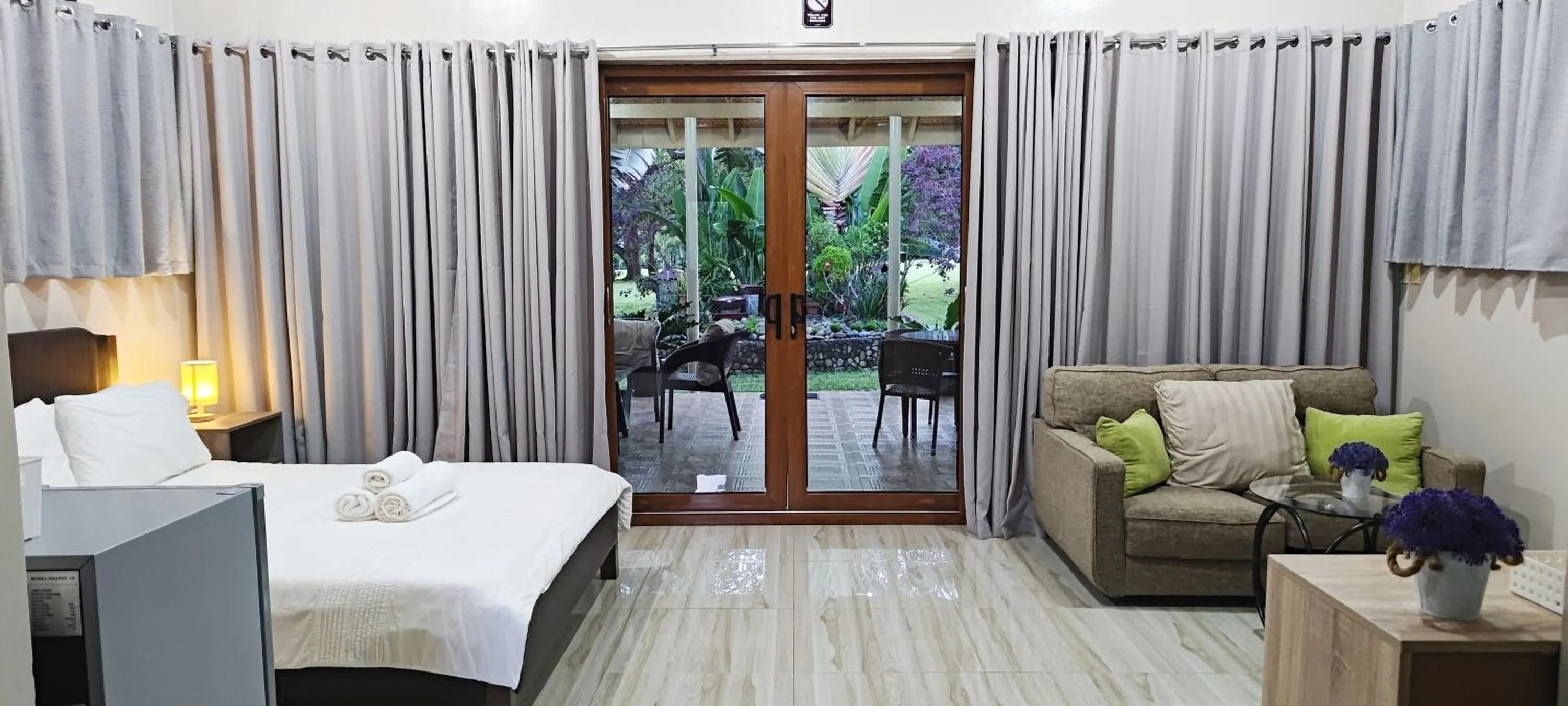 Property building, Bed in Denika's Suites