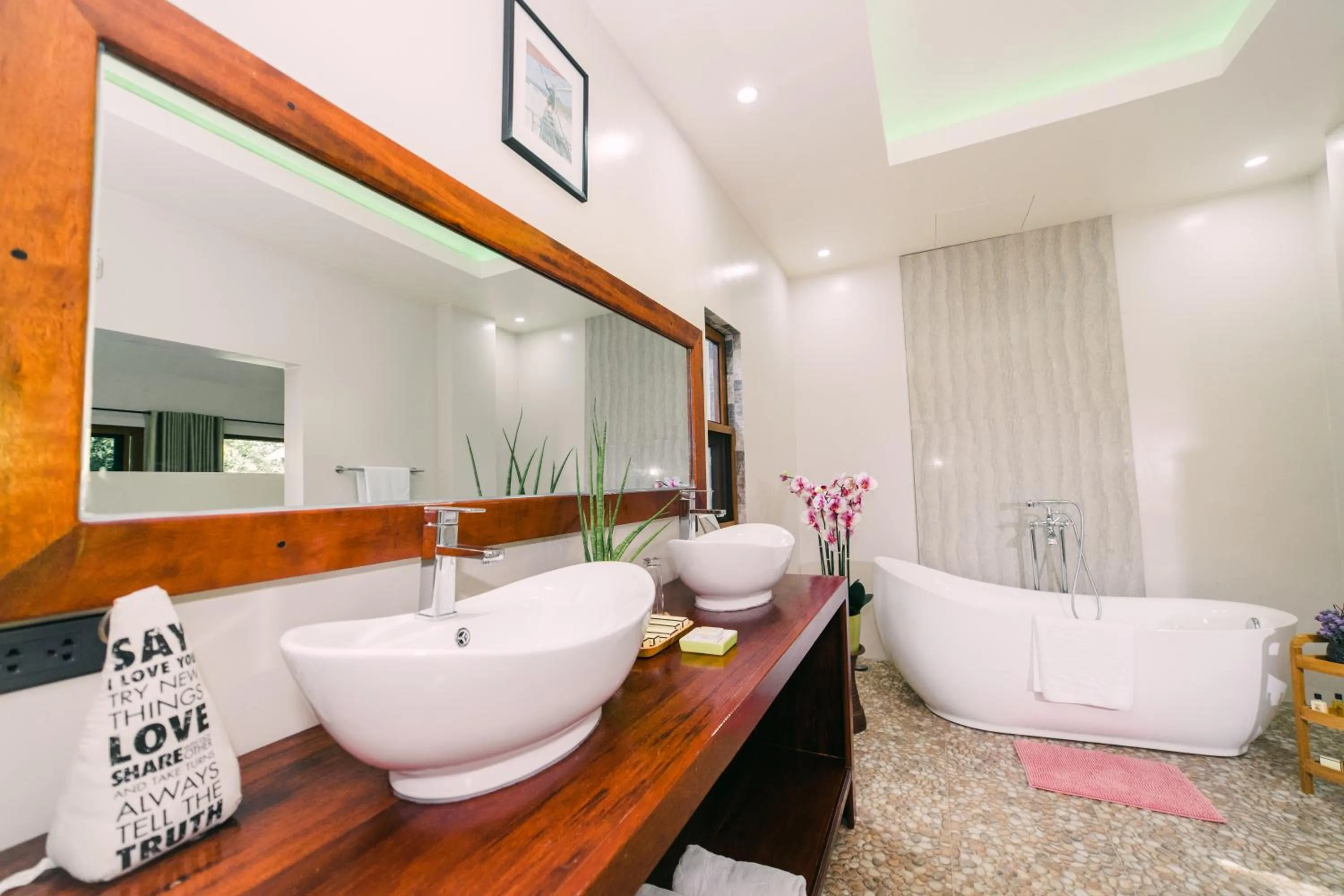 Bathroom in Denika's Suites