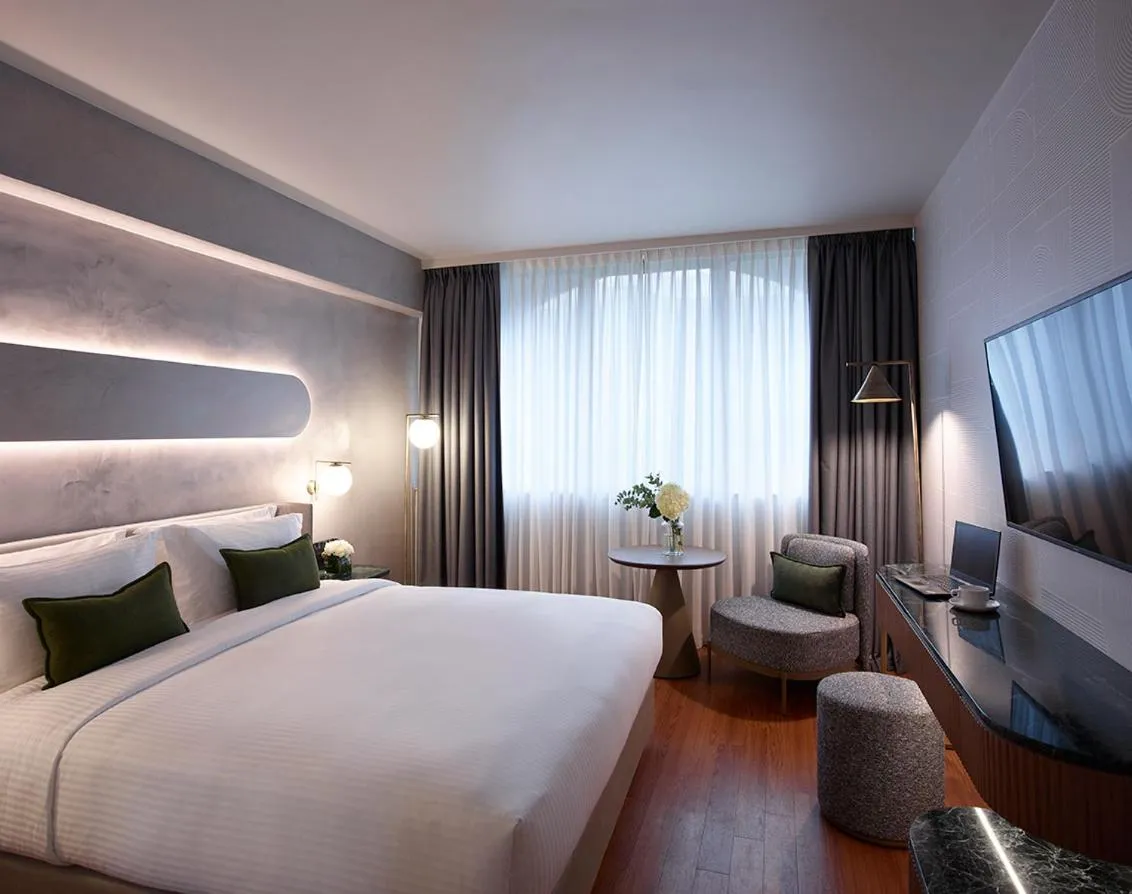 Bed in Titania Hotel