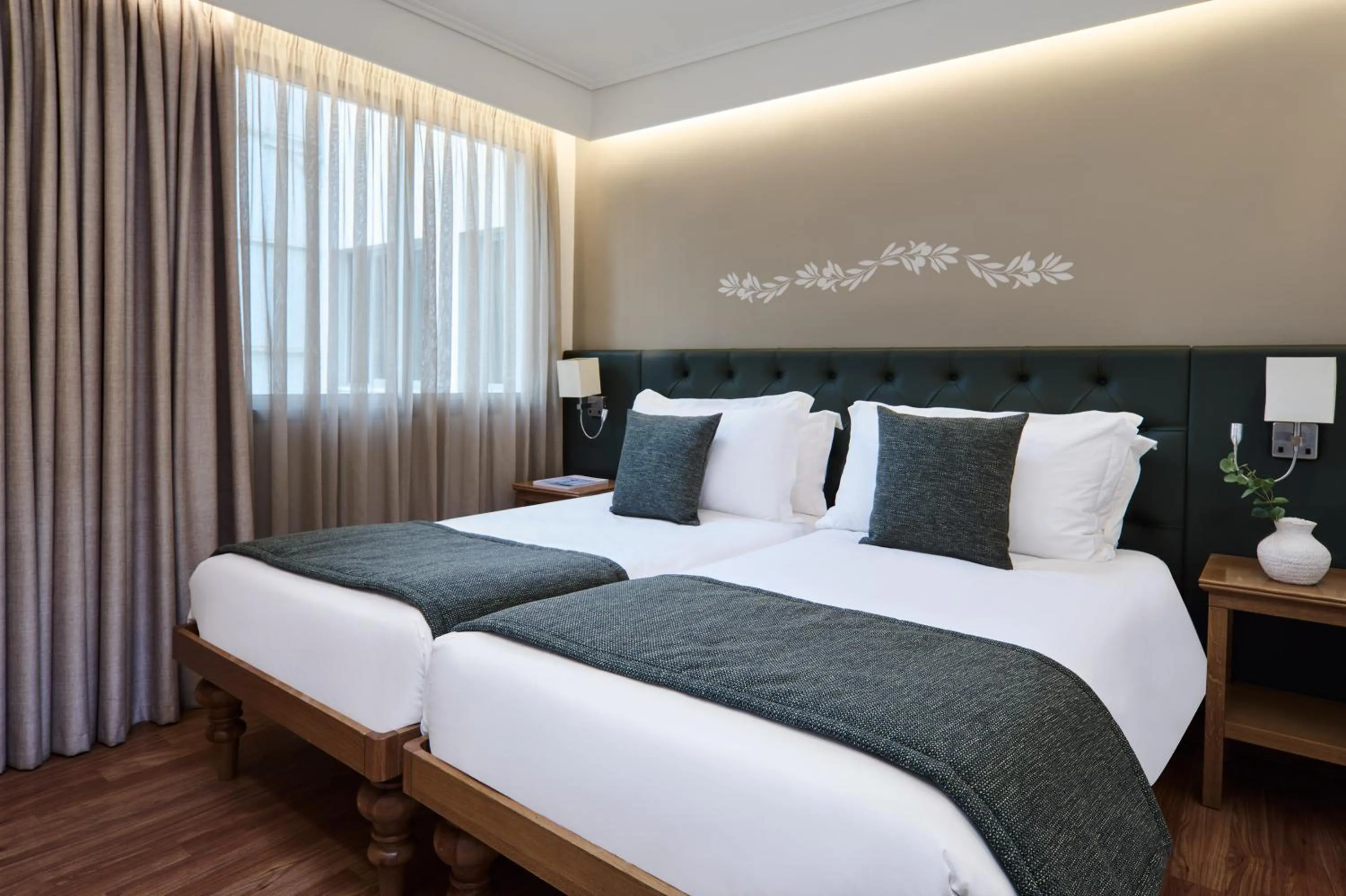 Bed in Titania Hotel