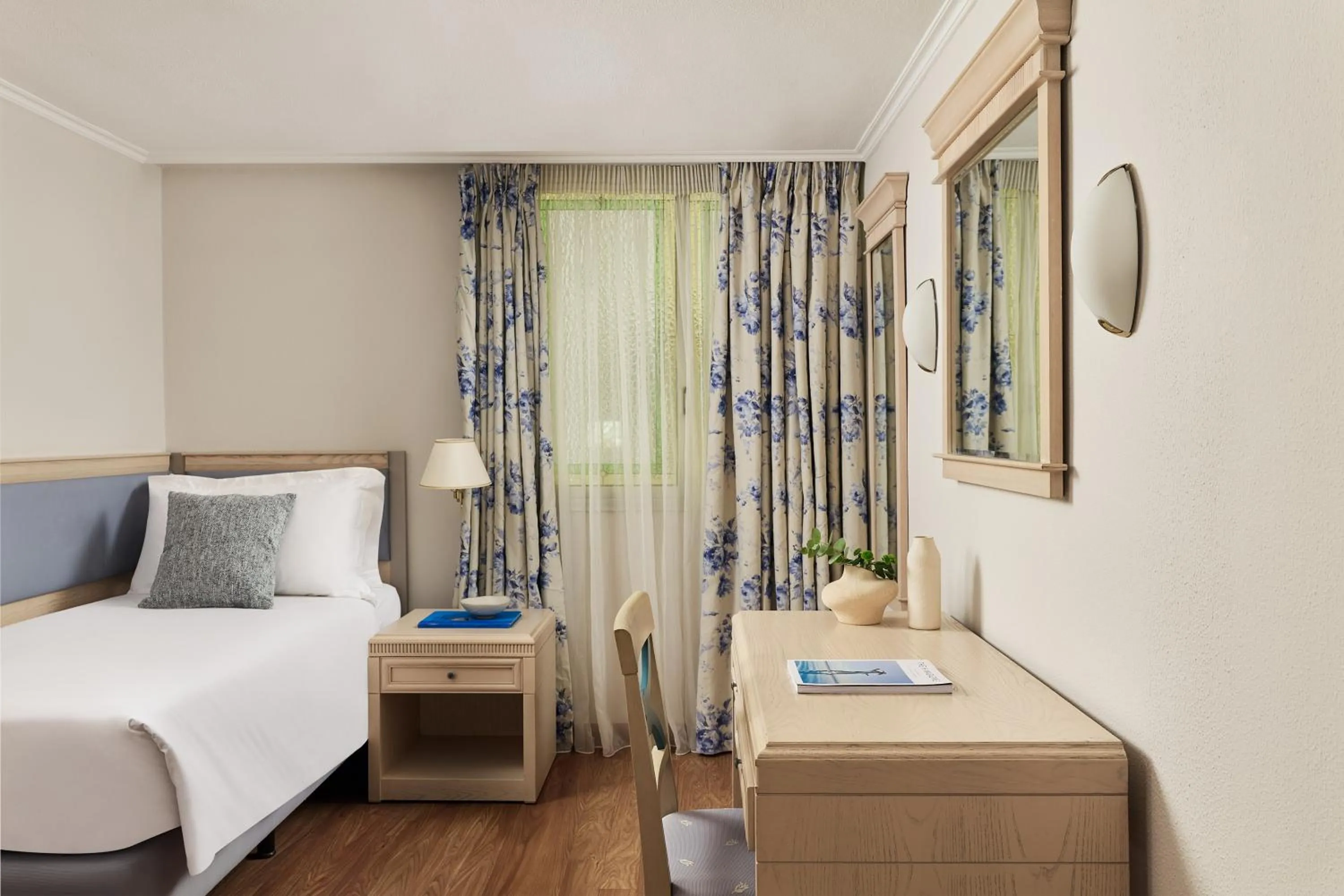 Bed in Titania Hotel