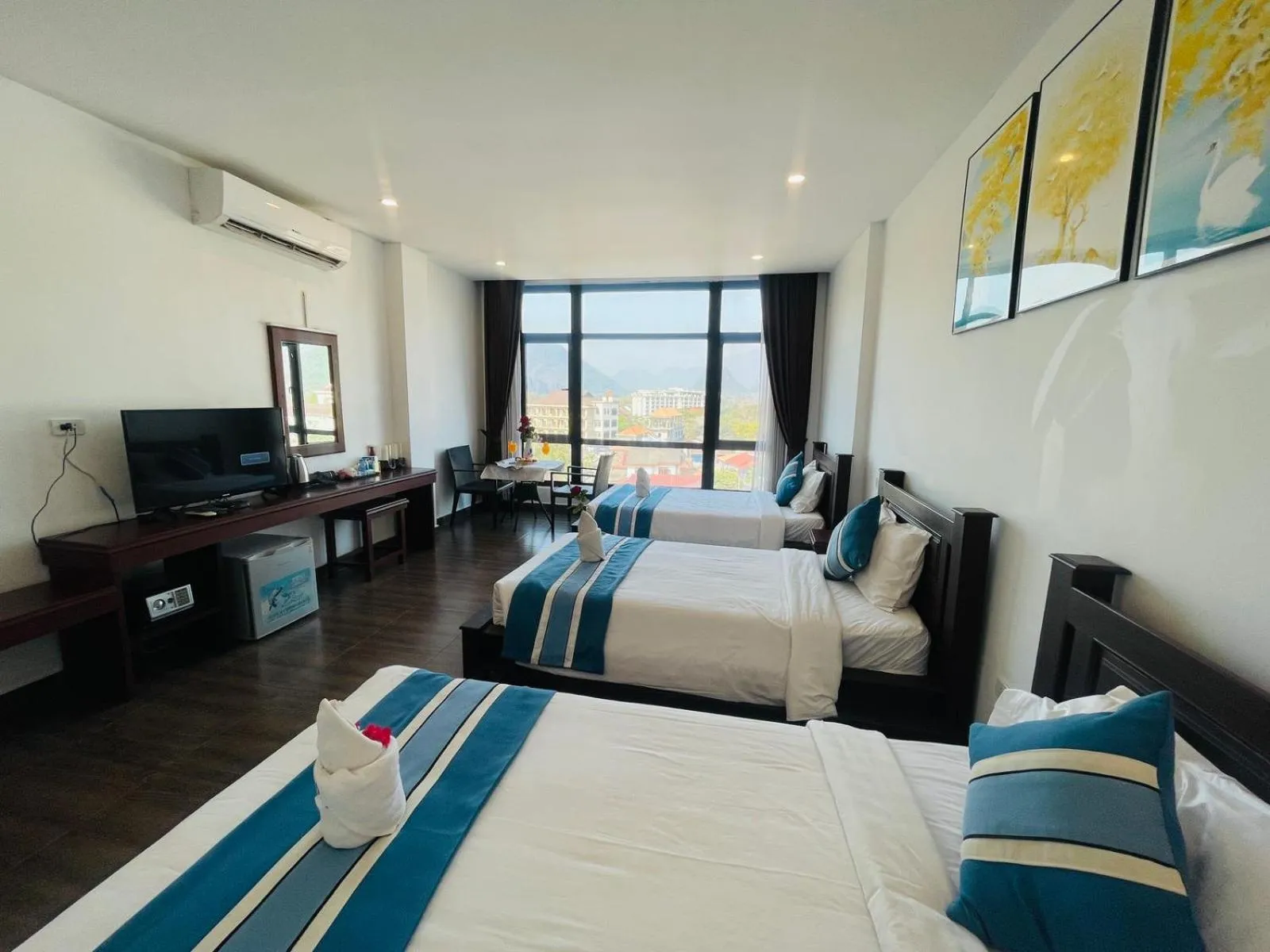 Bed in VANG VIENG TOPVIEW HOTEL