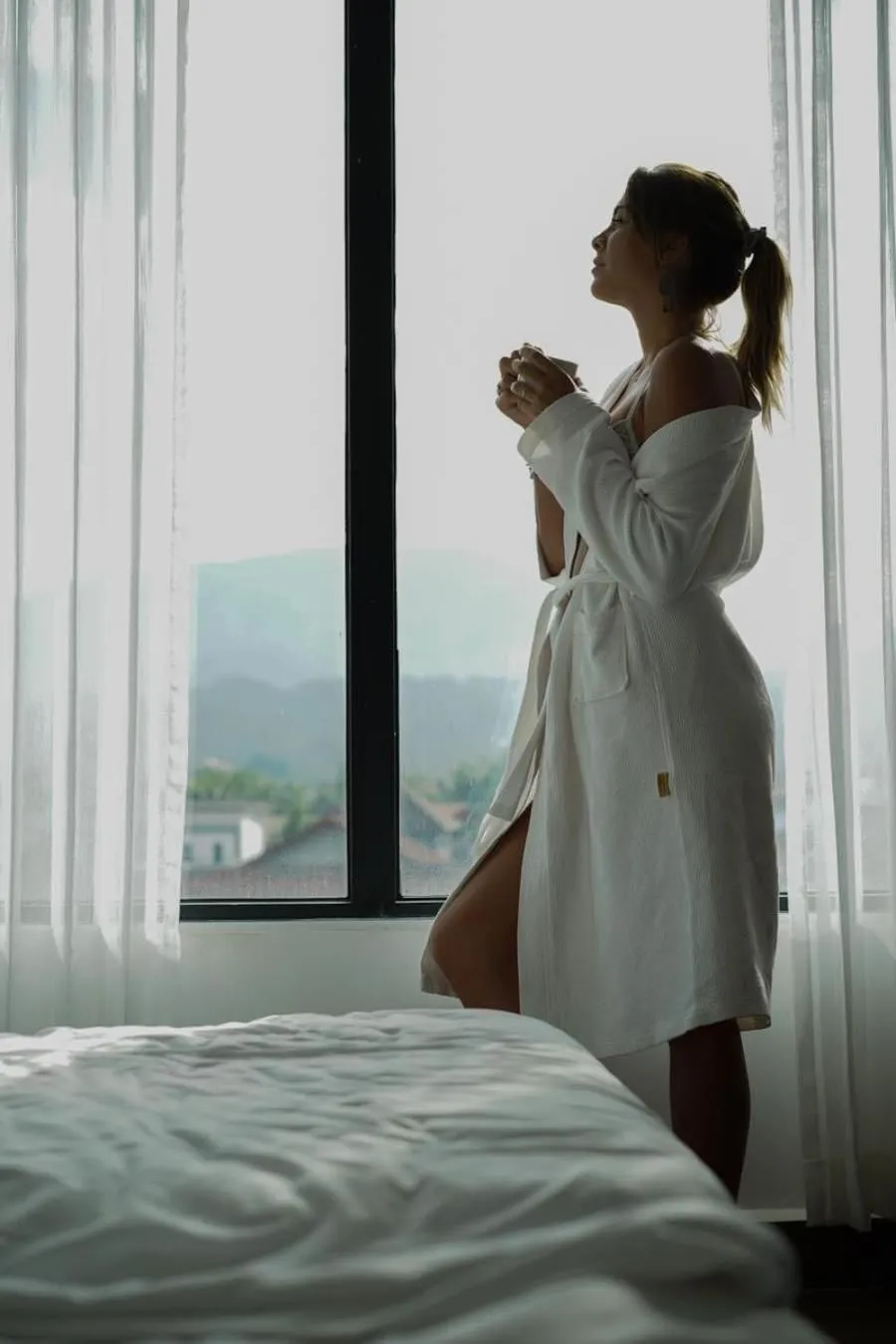 Bed in VANG VIENG TOPVIEW HOTEL