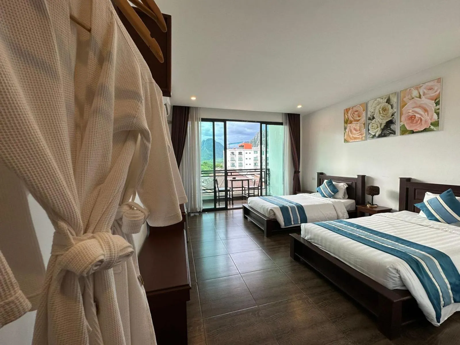 Bed in VANG VIENG TOPVIEW HOTEL